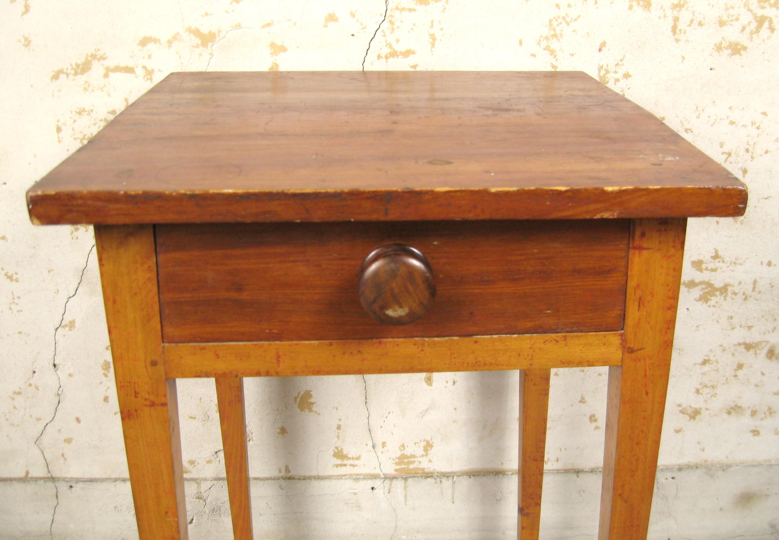 Antique Primitive Farm work 1 Draw table with Tapered Leg is a rare find for collectors and enthusiasts of historical furniture. Its great natural color, country-style theme, and wood material make it a unique addition to any Farmhouse or home