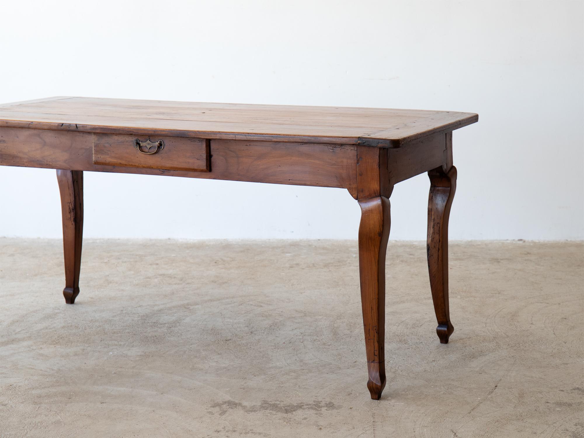 A provincial cherrywood farmhouse dining table with drawer to one side. French, 19C.

Stock ref. #1720

78 x 166 x 79.5 cm (30.7 x 65.4 x 31.3 “)

Leg clearance: 61.5 cm (24.2 “).