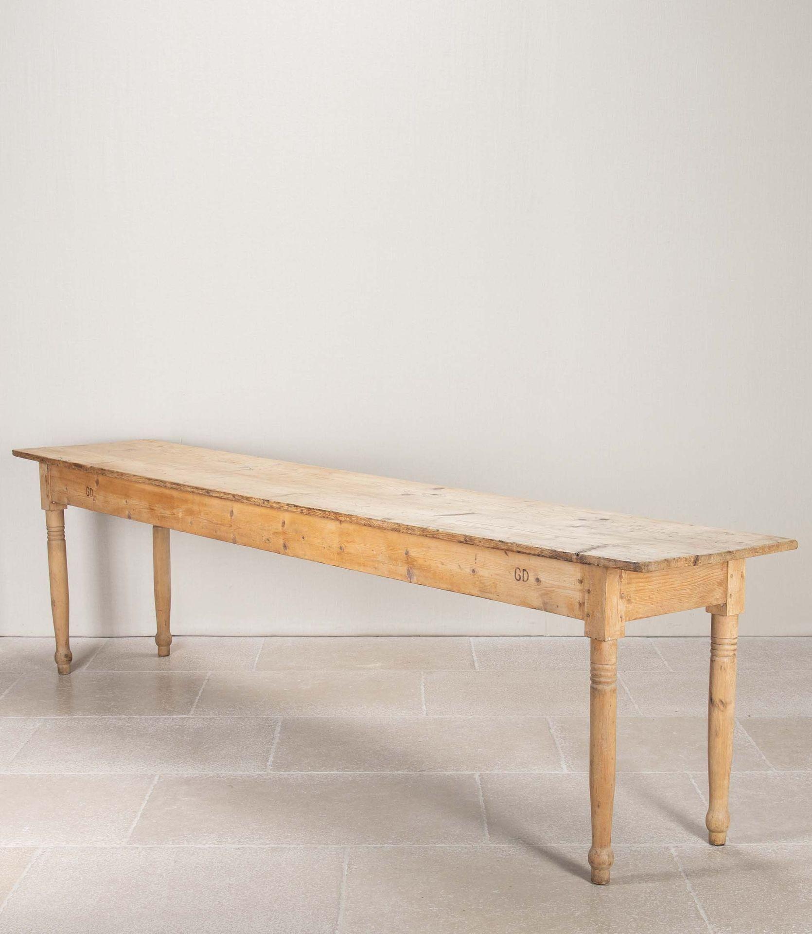 An elegant late 19th Century Swedish Provincial pine console. 
It is long and narrow with the maker's initials decorating its apron. It would be perfect as either a console or a serving table.
Circa 1880.