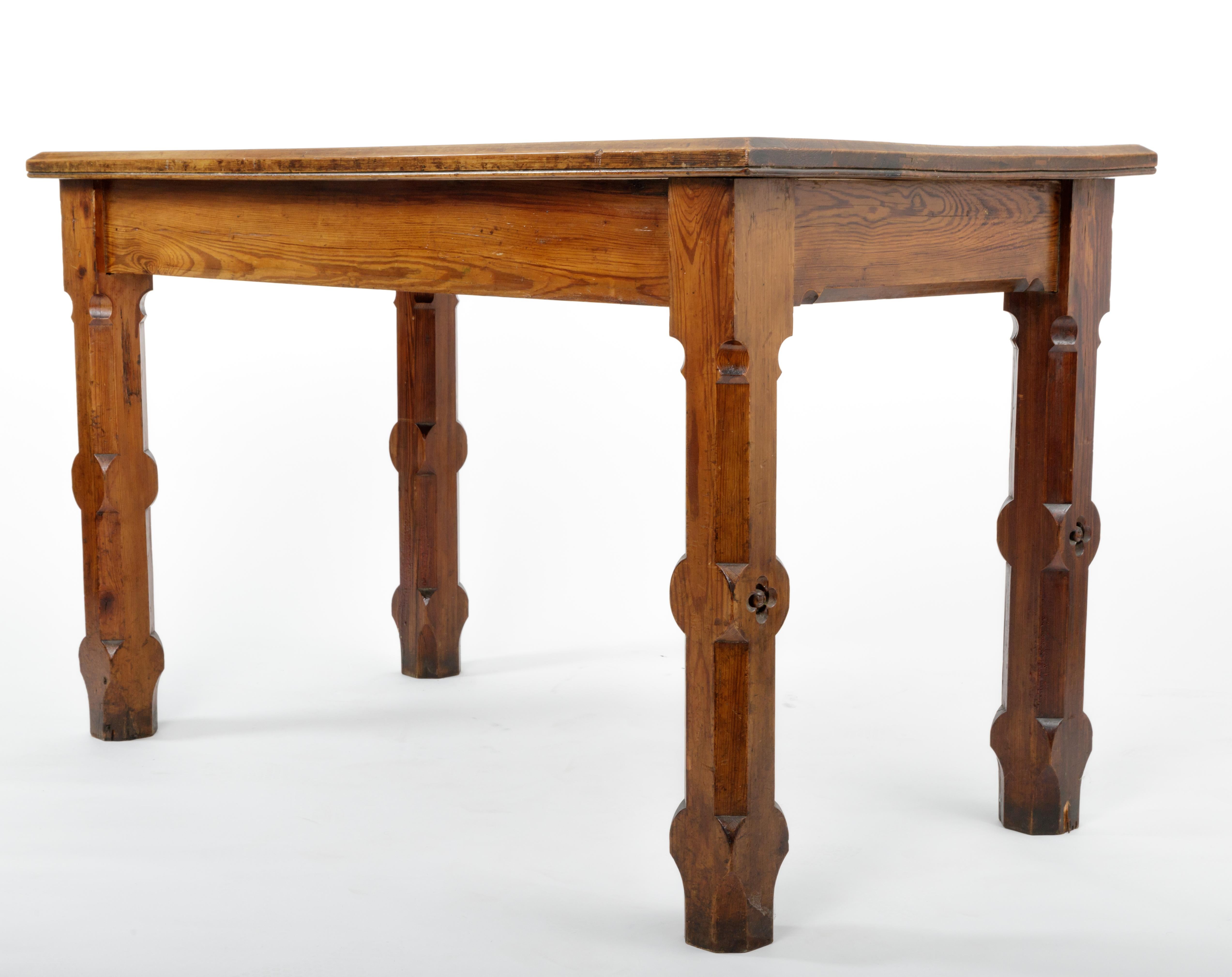 Pugin style English pine table, England, 19th century.