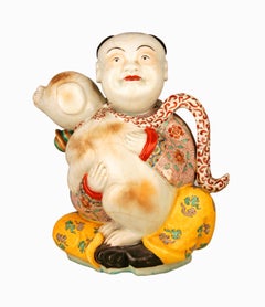 19th Century/Qing Dinasty Glazed Hand-Painted Porcelain Man and Dog Figurine