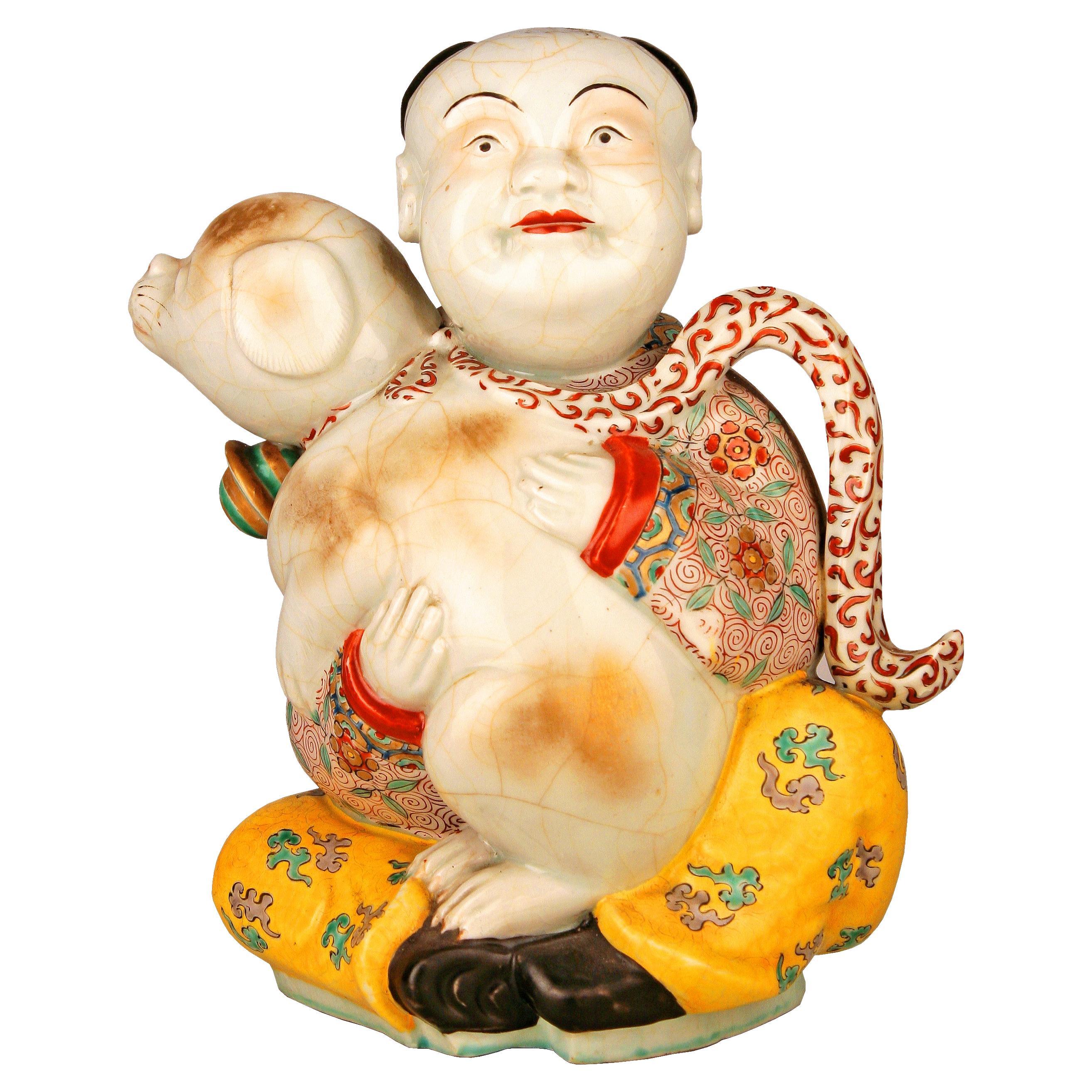 19th Century/Qing Dinasty Glazed Hand-Painted Porcelain Man and Dog Figurine For Sale