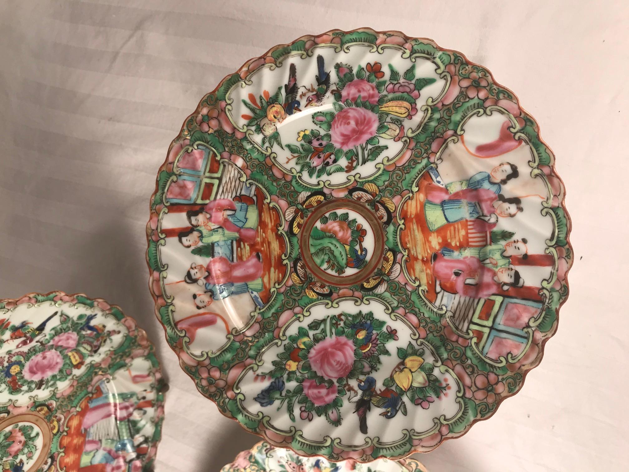 19th century Qing period, 12 Chinese Rose Medallion porcelain dinner plates

12 delicate antique eggshell dinner plates with scalloped rim. The 19th century plates are decorated with traditional rose medallion design of village scenes, florals and