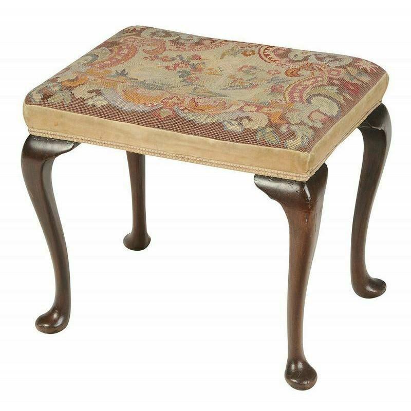 Queen Anne style upholstered stool 19th century This stool has an early needlepoint covered seat. Corner blocks are replaced.