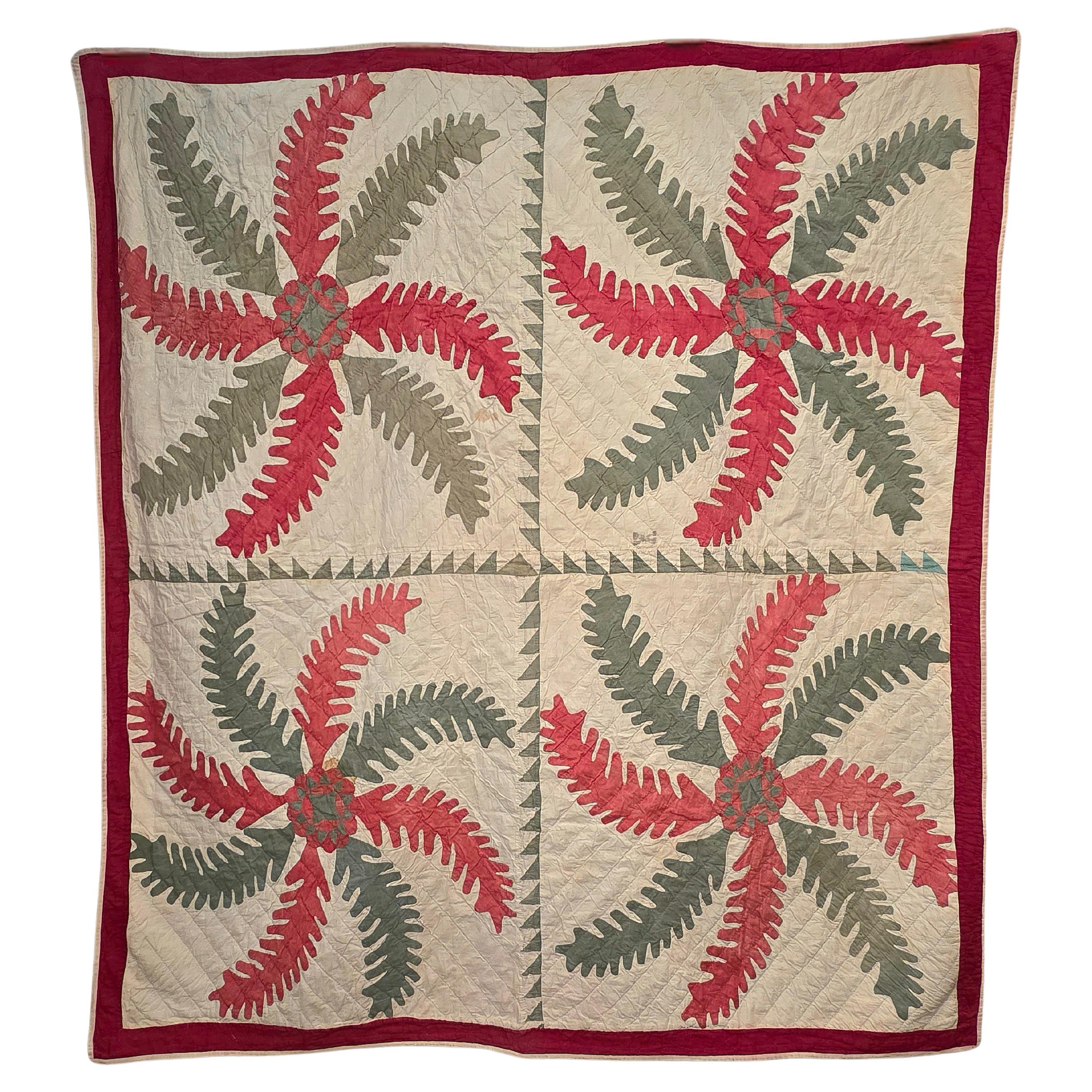 Striking and beautiful New England quilt in the princess feather and rose pattern. Excellent condition with a highly folky design pattern. Found in , this quilt made from blue and red, and green and white cotton is in nice condition. 
Please feel