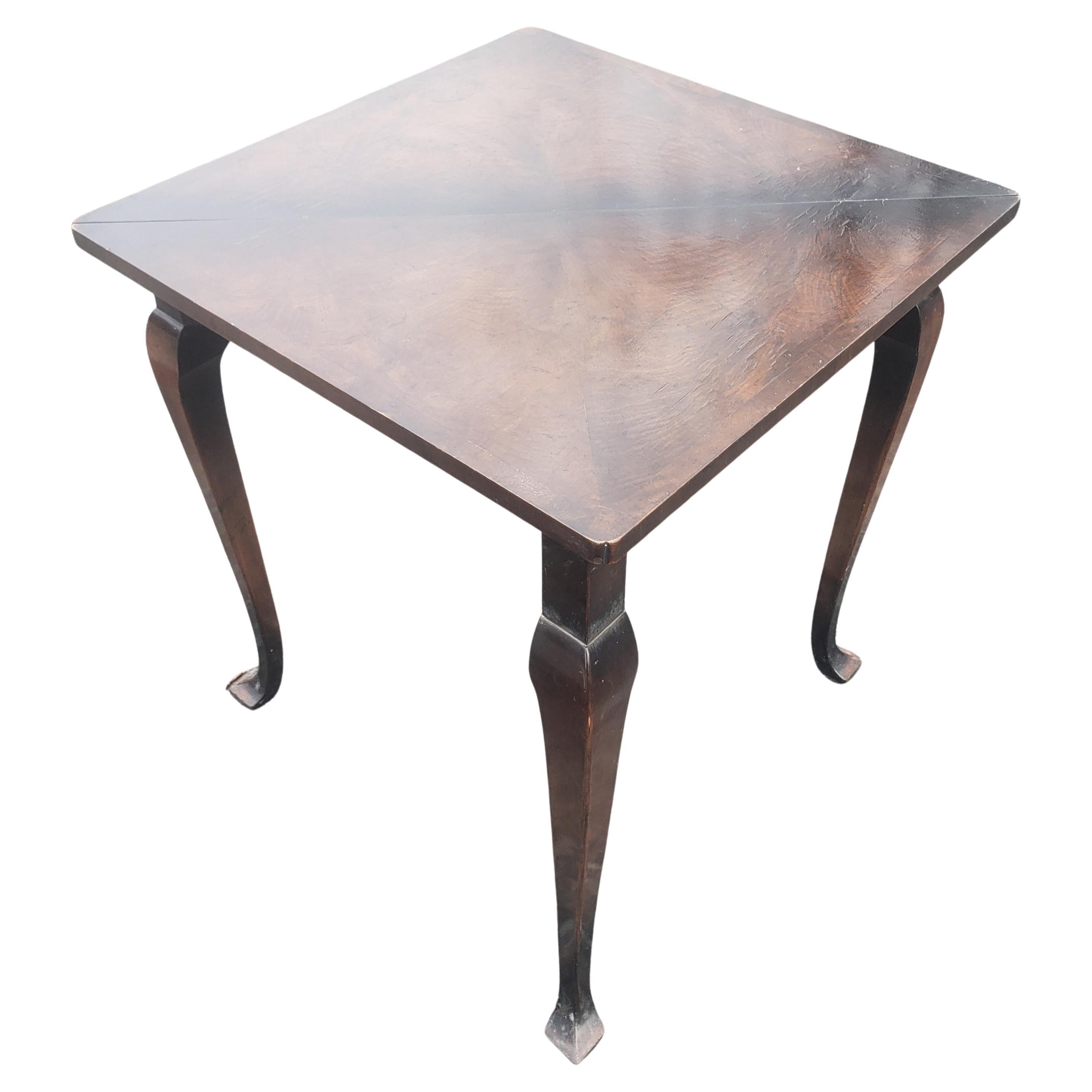 A rare 19th century English walnut and burl walnut hankerchief card table or tea table.
Measures approximately 33.5