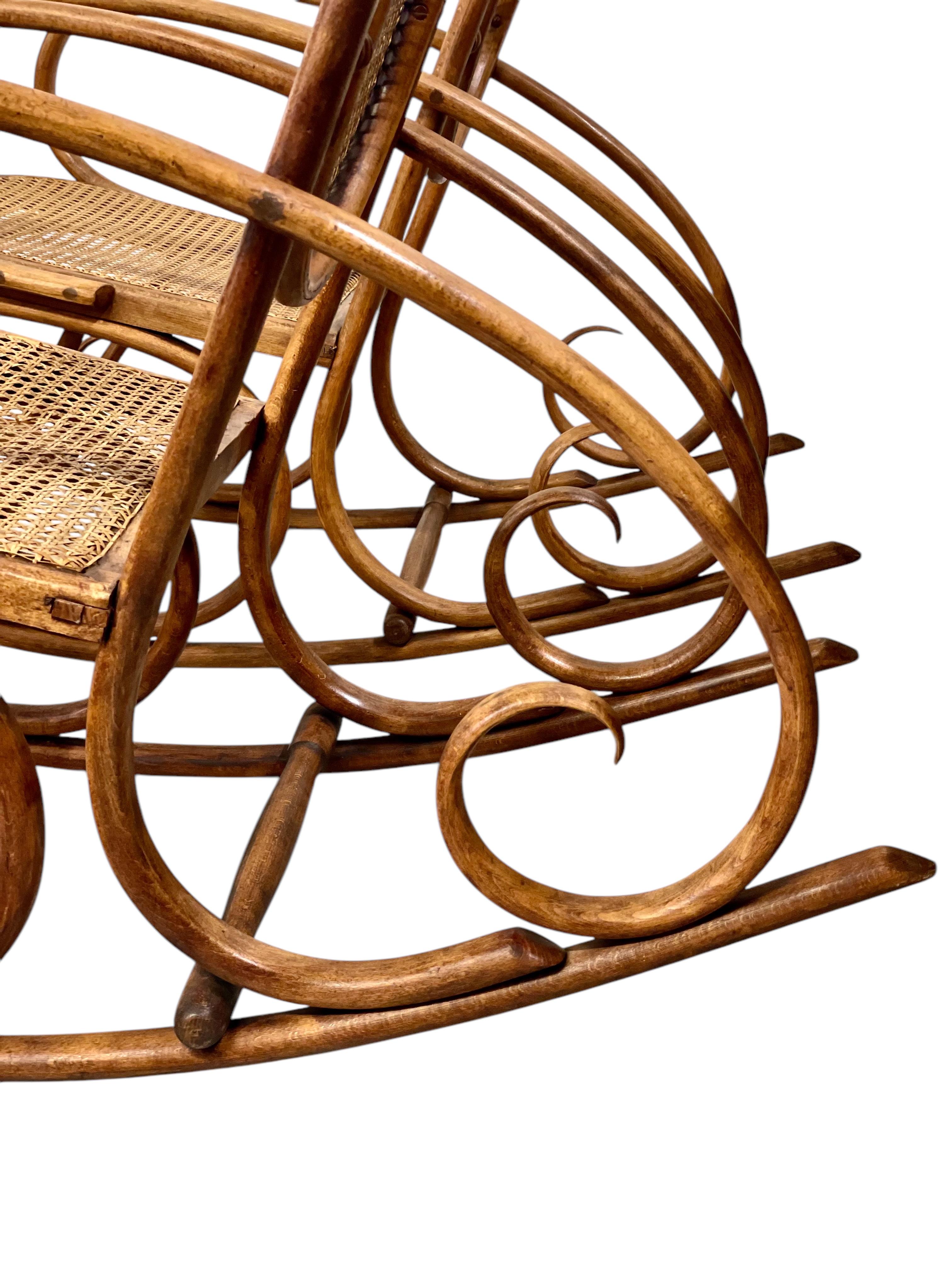 19th Century Rare Pair of Beechwood and Cane Rocking Chairs For Sale 5