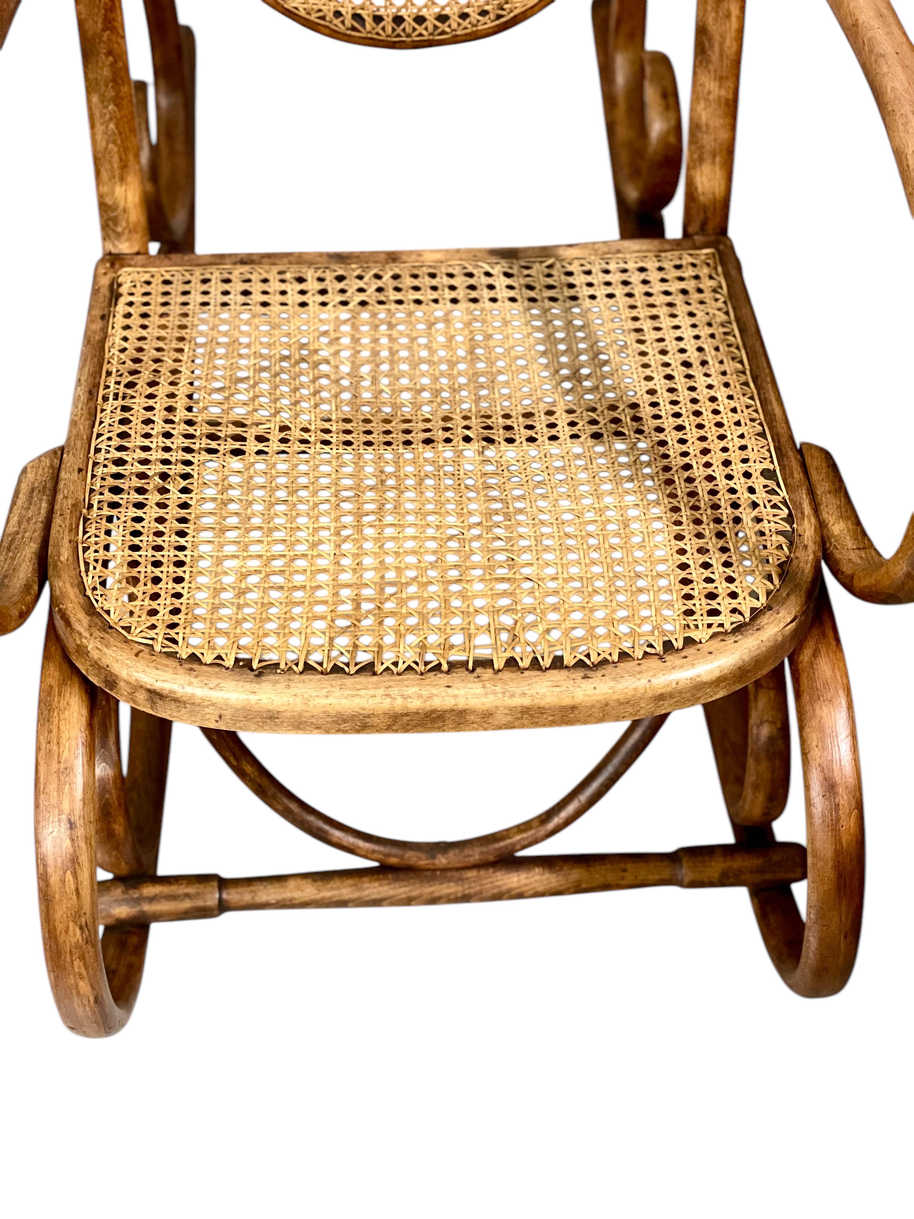 Austrian 19th Century Rare Pair of Beechwood and Cane Rocking Chairs For Sale
