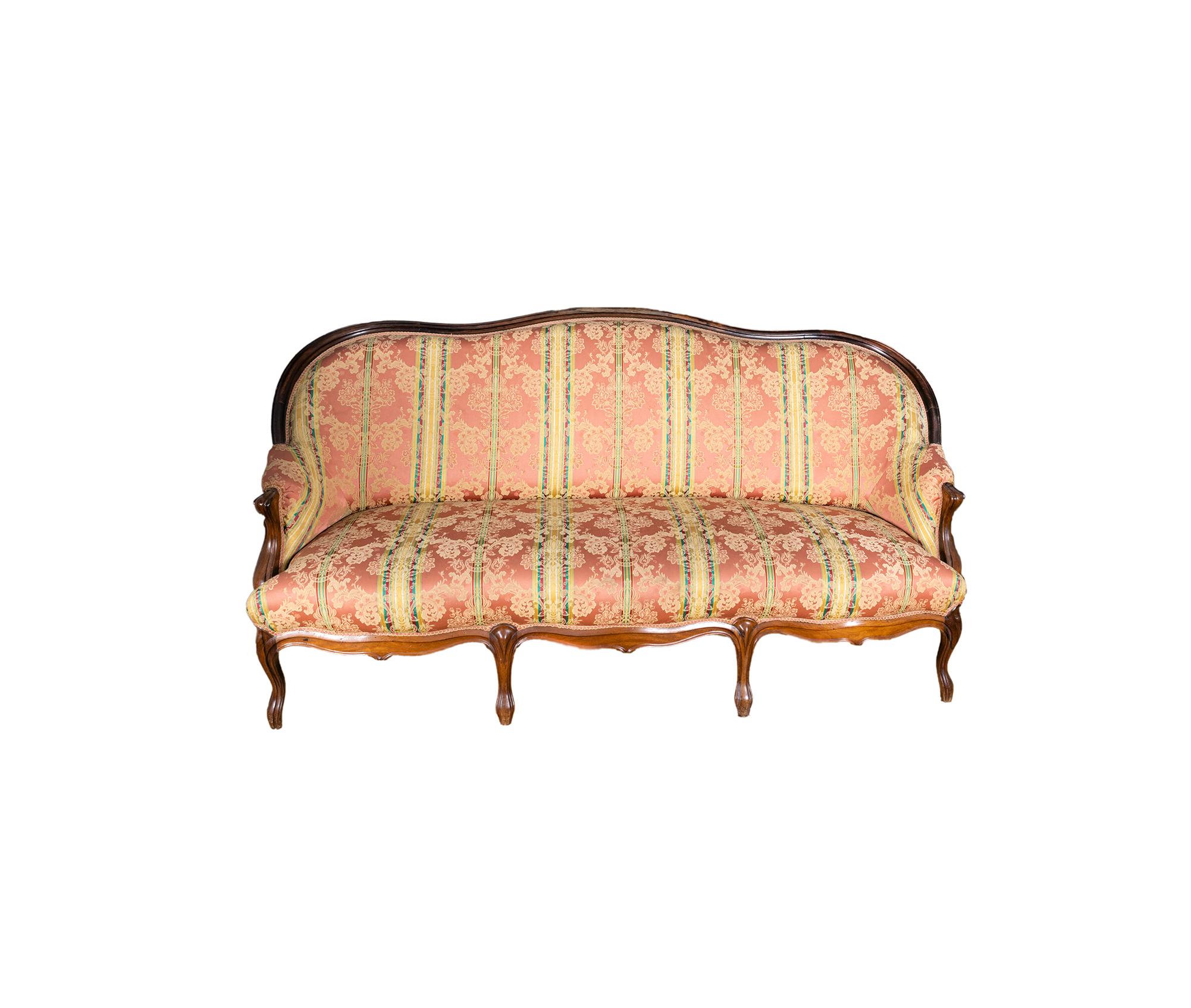 A one of a kind rosewood solid canapé sofa with flawless luxury fabric and upholstery pink background with an intrinsically detailed monogram work.  
D. José Style from the second half of the 18th century, of Rococo influence, has slender, slightly