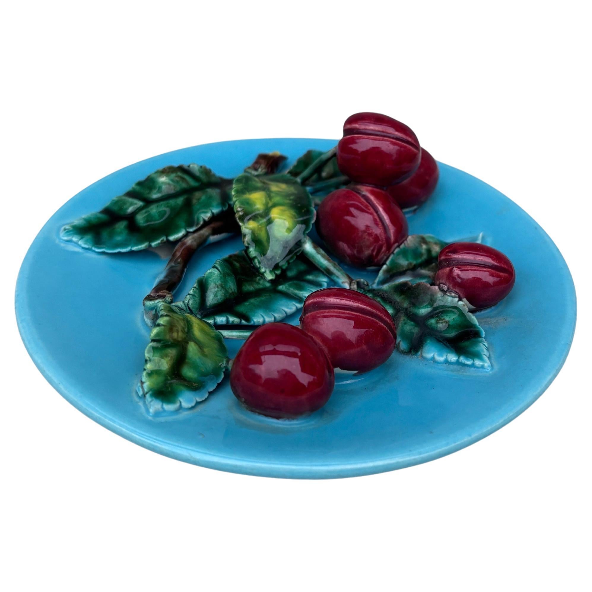 19th Century Rare Small Majolica Plum Platter signed Perret Gentil Menton.
French Riviera.
5.5 inches diameter.