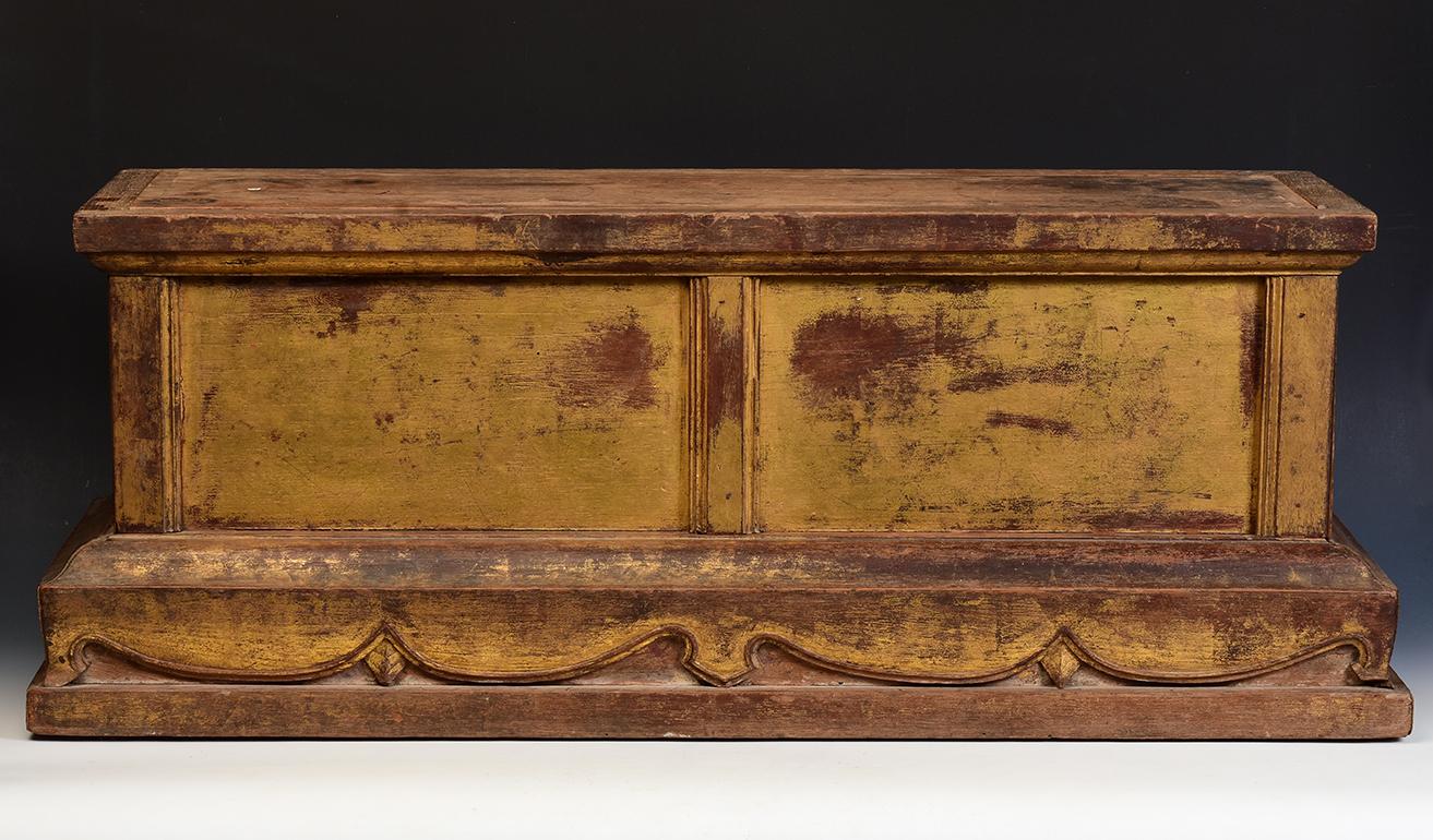 Thai manuscript wooden chest with gilded gold.

Age: Thailand, Rattanakosin Period, 19th Century
Size: Length 87.5 C.M. / Width 30.8 C.M. / Height 33.4 C.M. 
Condition: Nice condition overall (some expected degradation due to its age).

100%