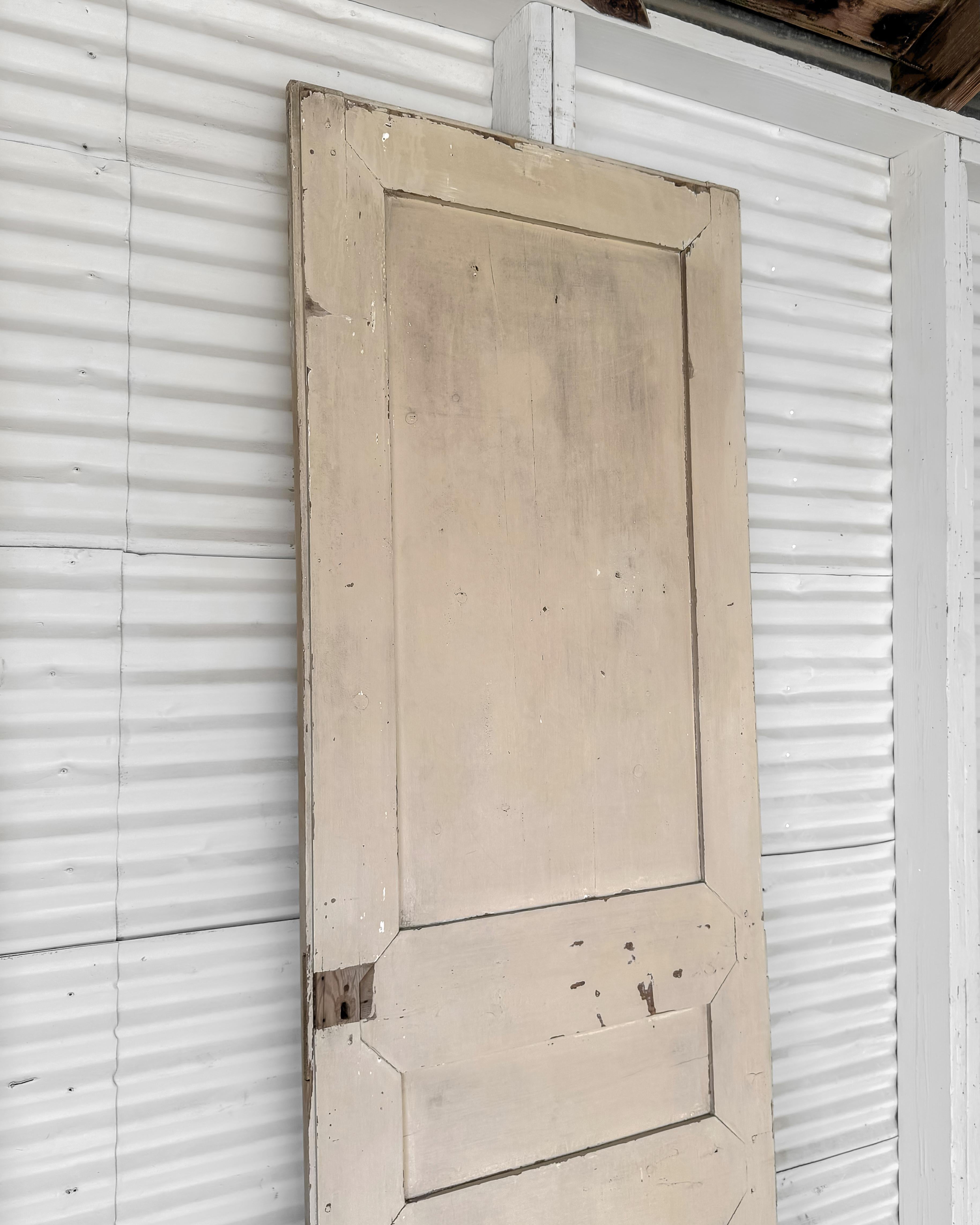 19th Century Reclaimed 3-Panel French Door with Worn Original Apricot Paint For Sale 8
