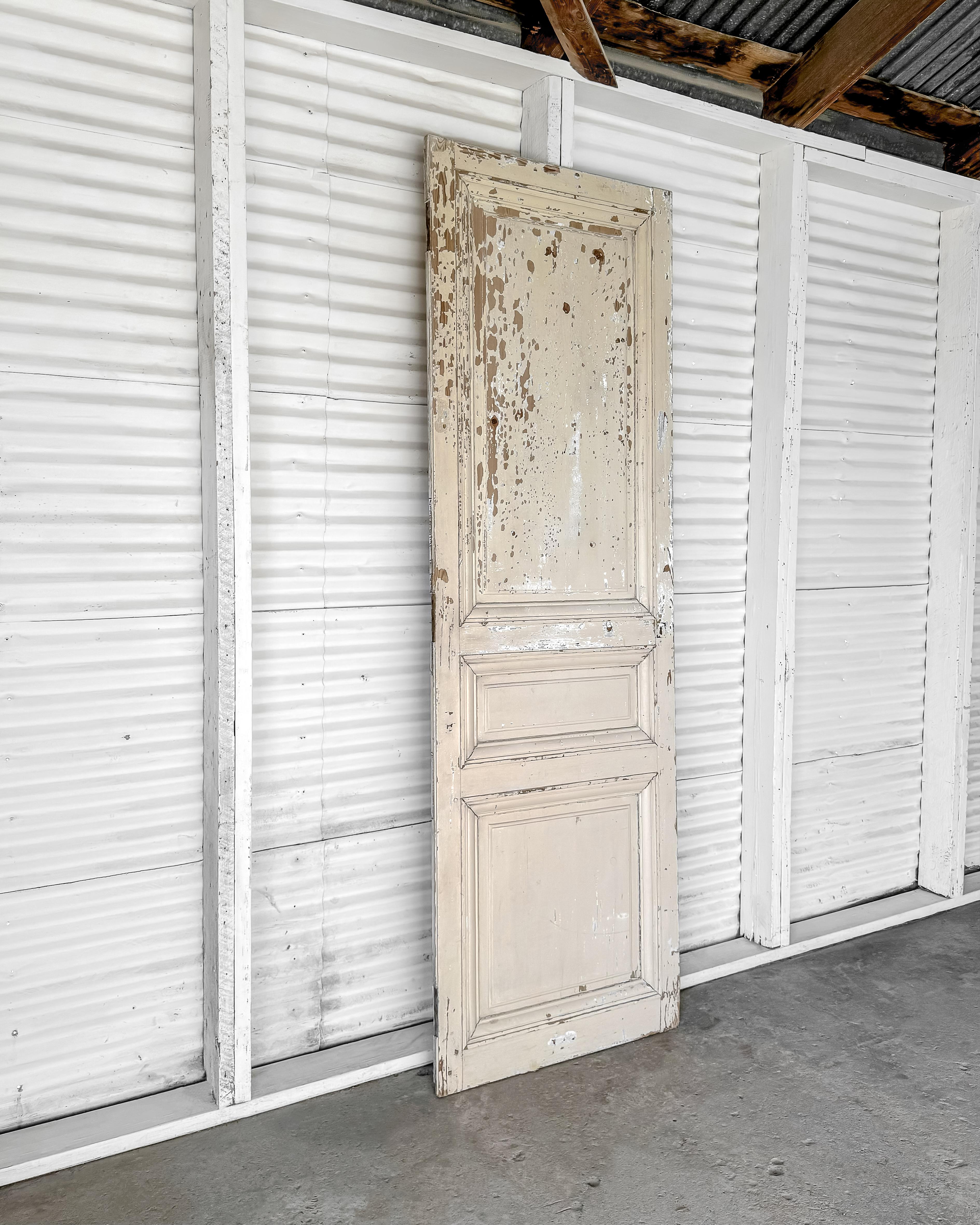 19th Century Reclaimed 3-Panel French Door with Worn Original Apricot Paint In Good Condition For Sale In Mckinney, TX