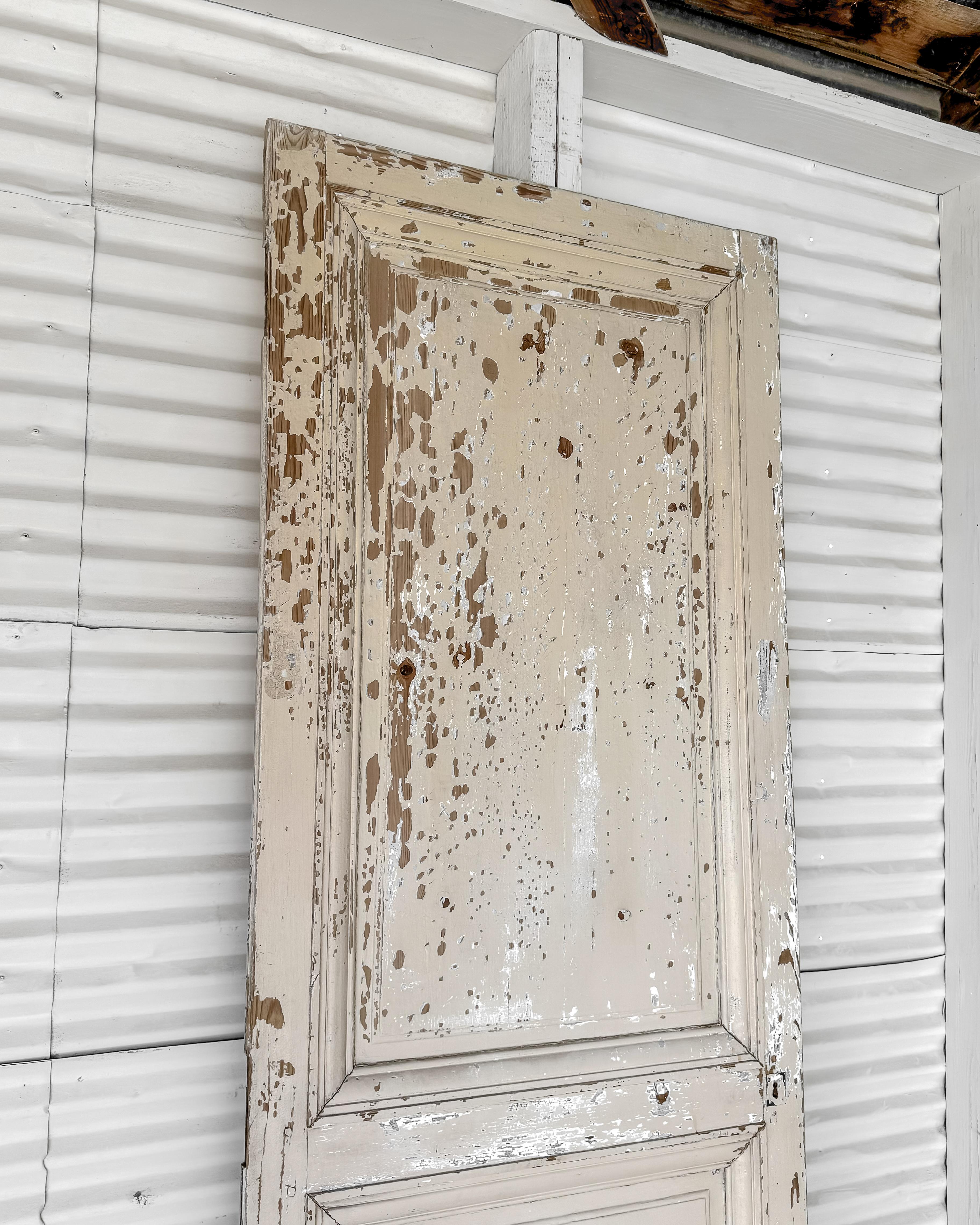 Wood 19th Century Reclaimed 3-Panel French Door with Worn Original Apricot Paint For Sale