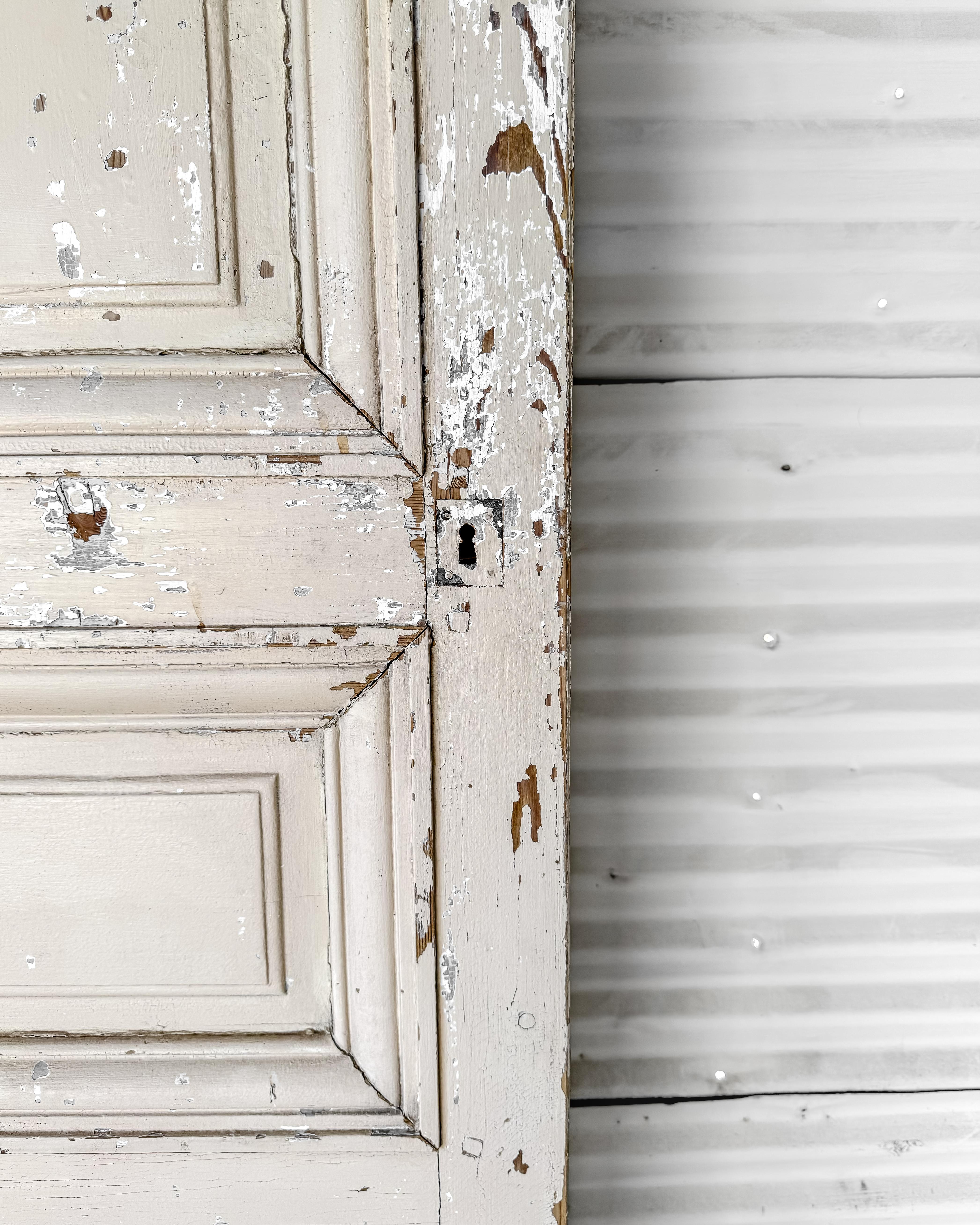 19th Century Reclaimed 3-Panel French Door with Worn Original Apricot Paint For Sale 4