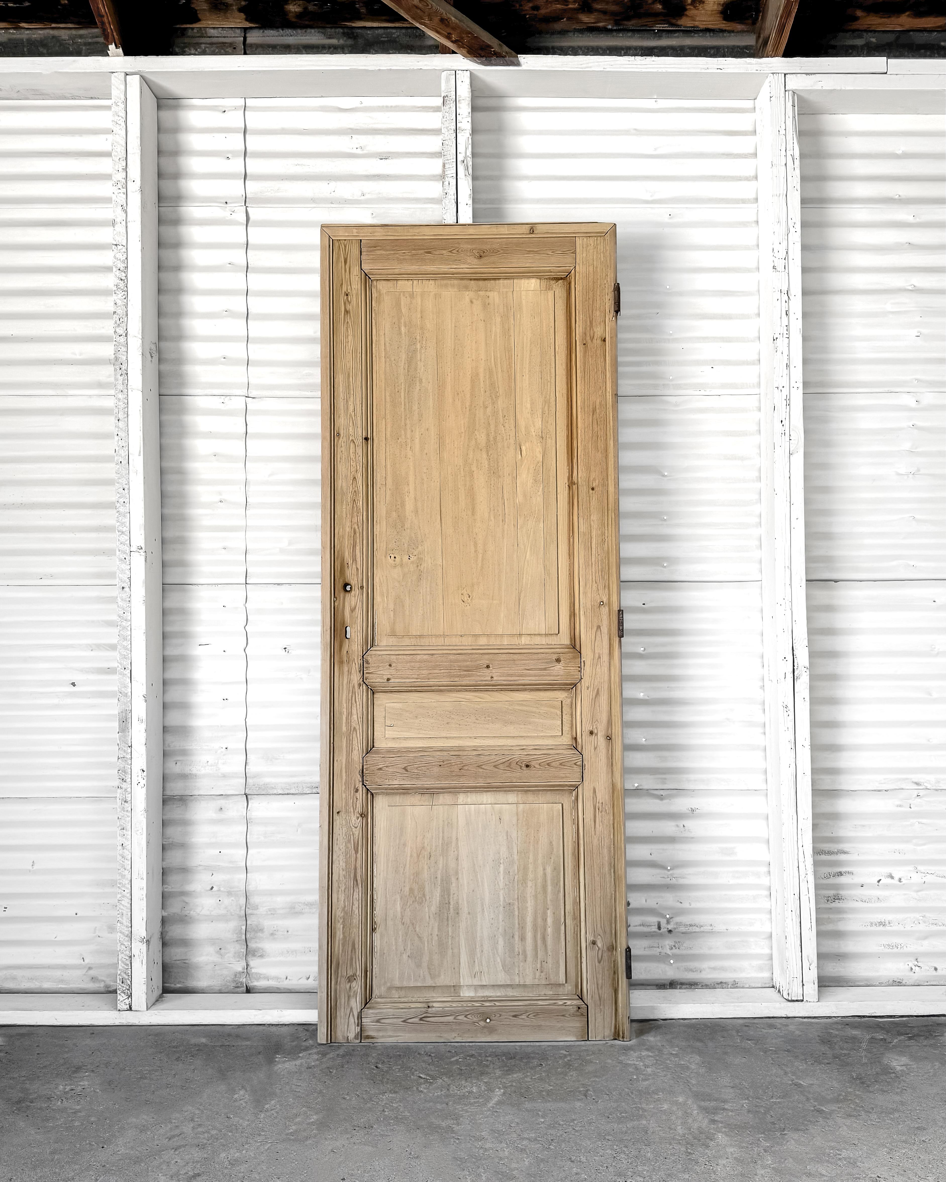 Fill your home with a sense of history when installing this 19th-century reclaimed door. Salvaged from an old home in Belgium, the door boasts grooved beveled trim detailing and showcases the skilled craftsmanship of its time.

Replace your modern,