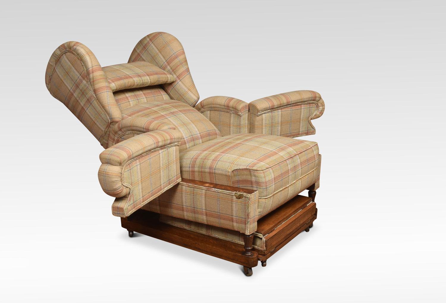 19th century wing armchair, the shaped reclining back above large movable arm rests, leading down to fully adjustable stool, Upholstered in tartan fabric. Raised on four tuned legs terminating in castors.
Dimensions:
Height 48 inches height to