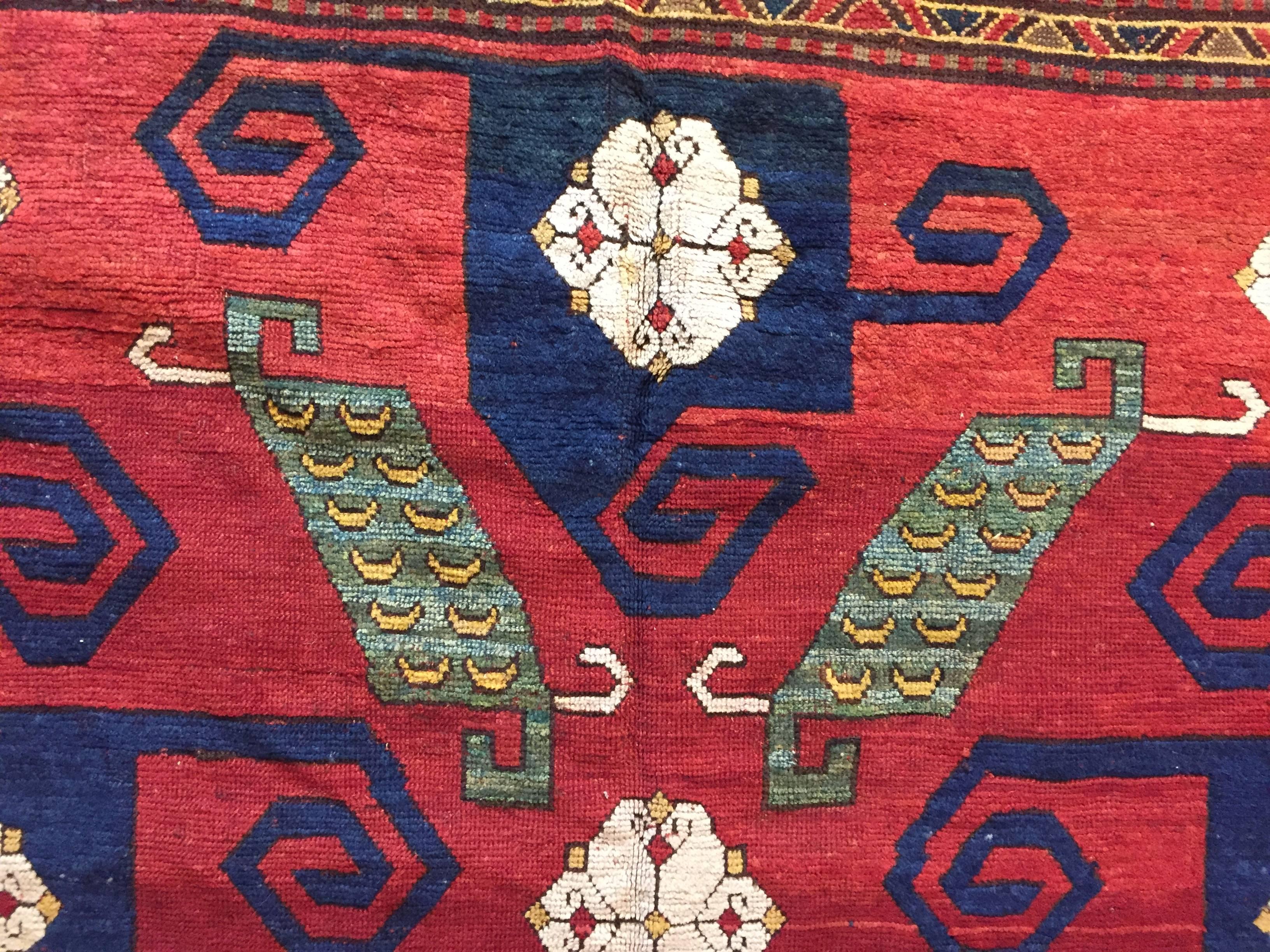 Hand-Knotted 19th Century Red Blue Green White in Wool Kazak Pinwheel Crab Caucaso Rug, 1850s