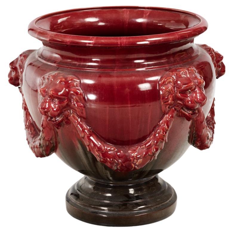 19th Century Red Glazed Jardiniere With Lion Head Masks For Sale