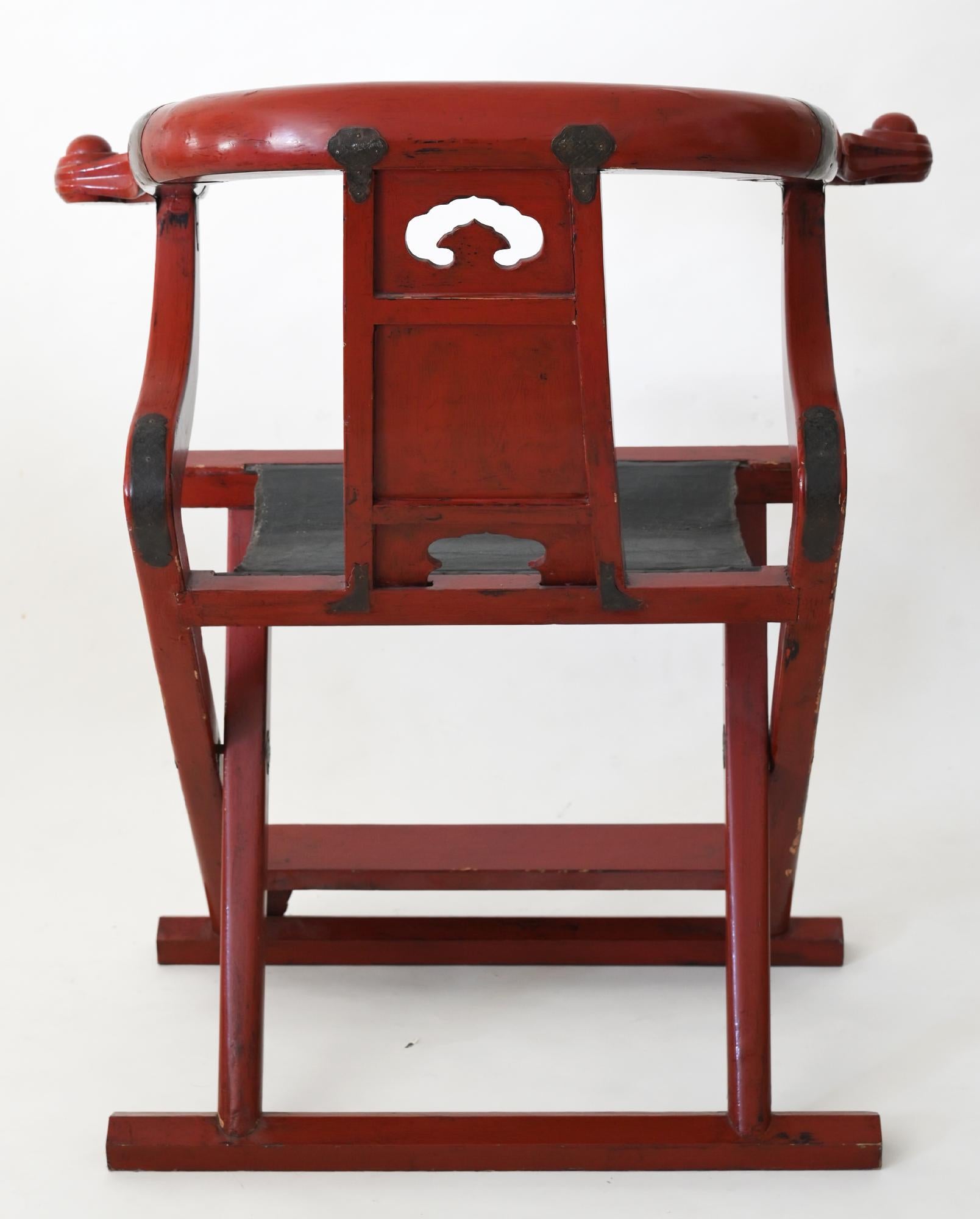The Chinese folding chair was made in the beginning of the 19th century. It is worked out very beautiful and the red lacquer is in a good condition. The form of the chair is very Classic for the classical Chinese.
   