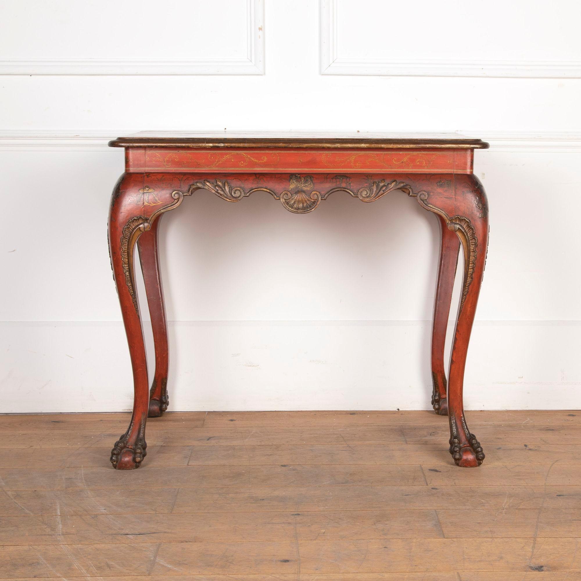 A stylish early 19th Century Italian centre table.This table is wonderfully decorated in red lacquer with gilt chinoiserie highlighted scenes in the form of people, buildings and foliage.Raised on carved cabriole legs with shaped apron centred with