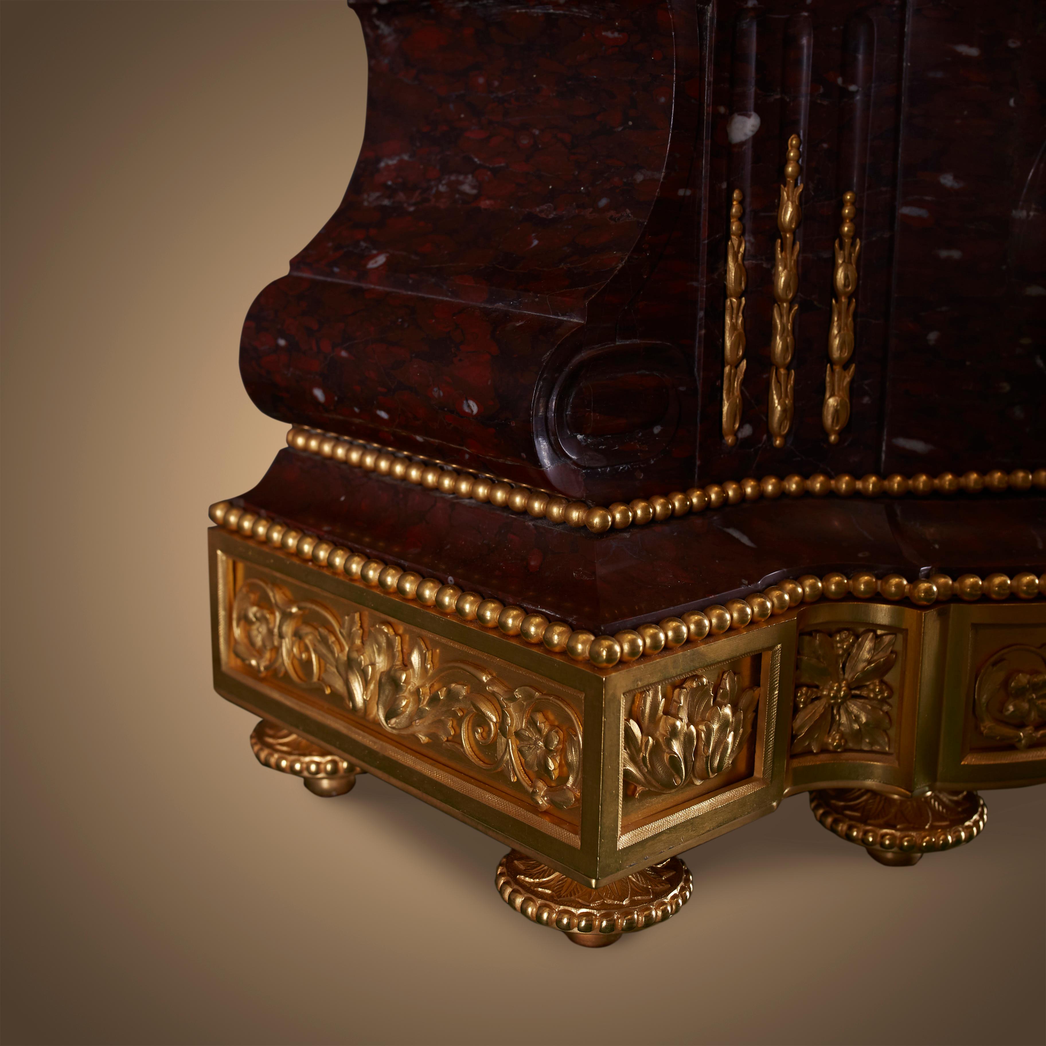 Gilt 19th century red stone clock For Sale