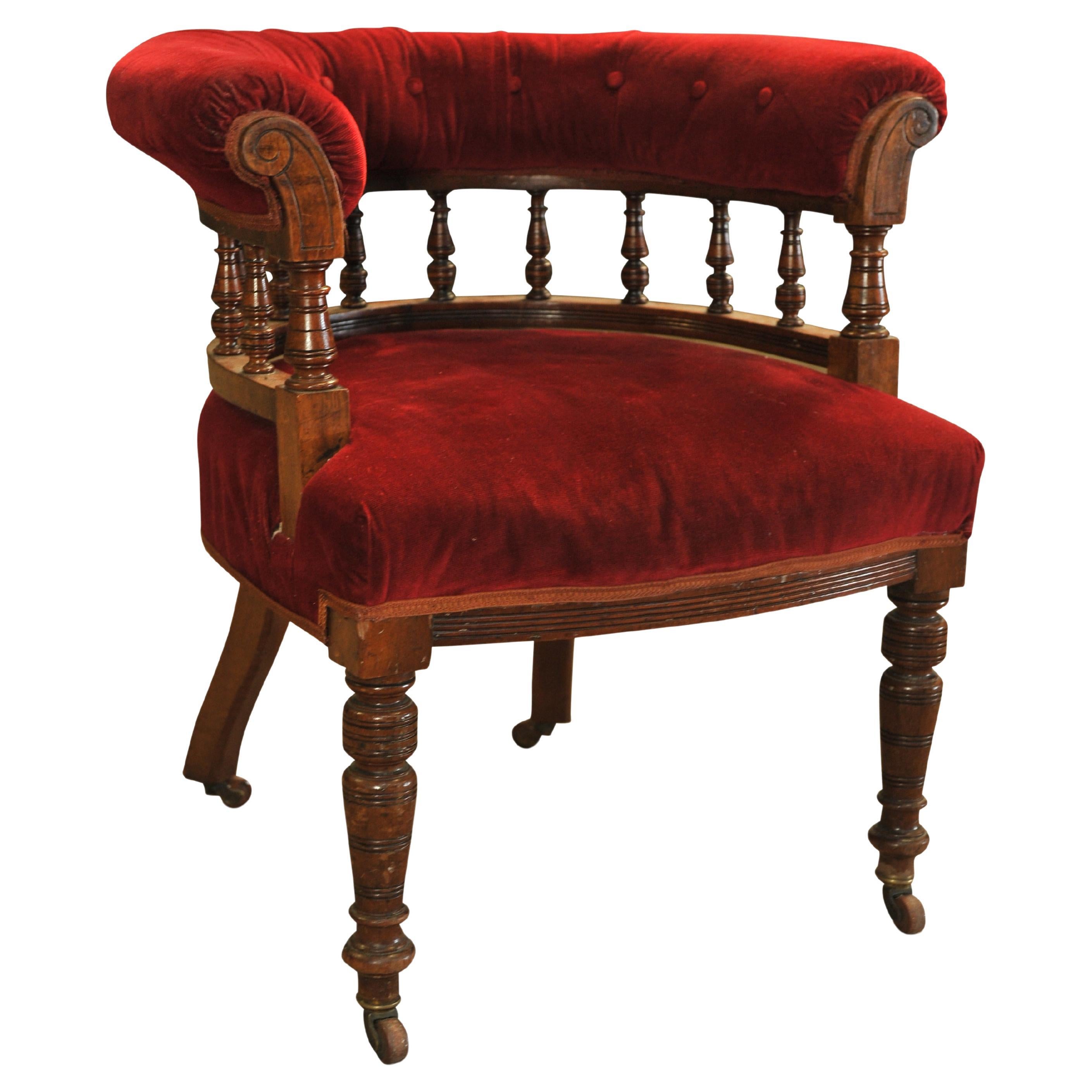 19th Century Red Velvet Leather Buttonback Captains Chair With Porcelain Castors For Sale