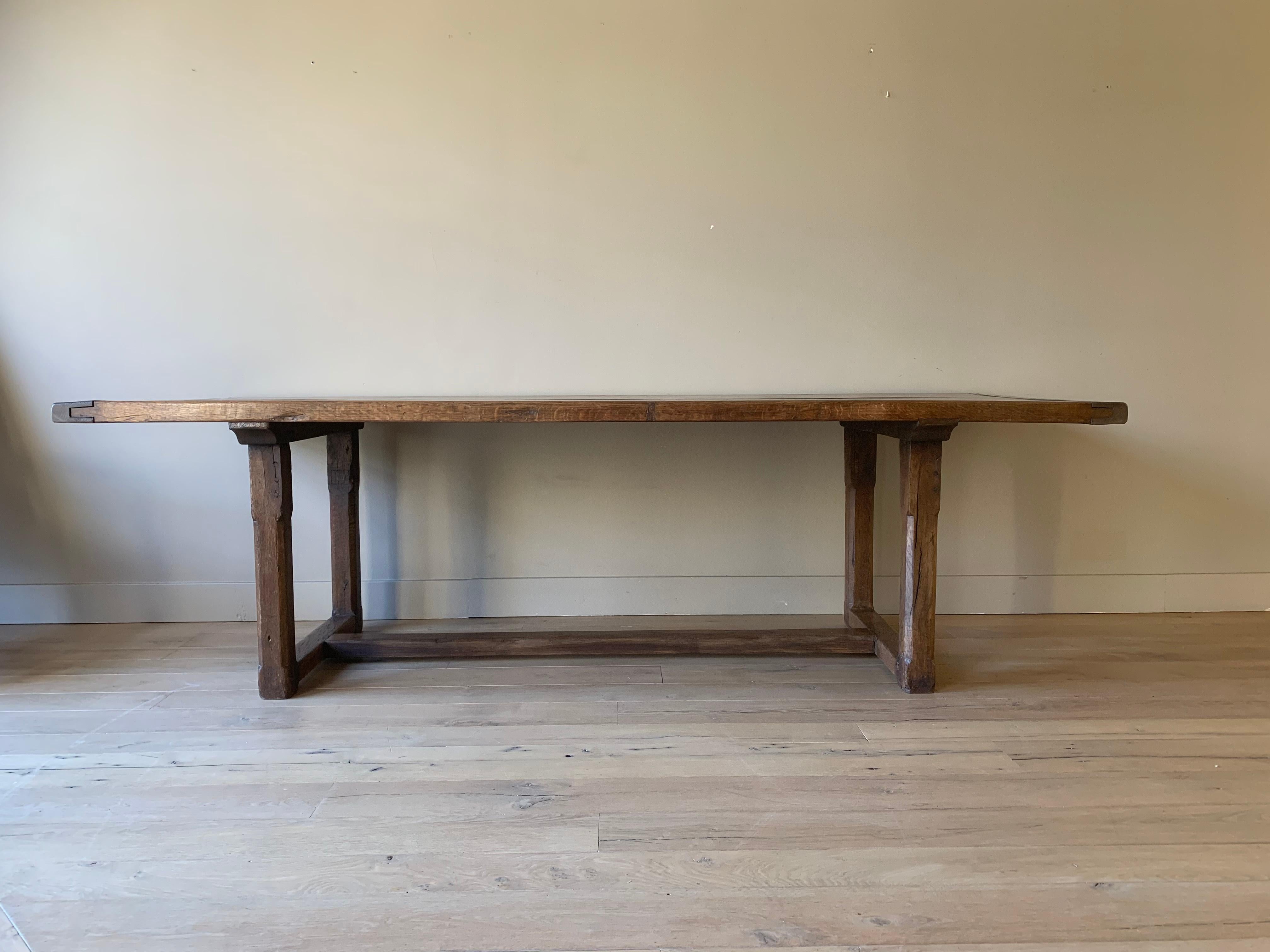 A great 19th century French Farmhouse table. The 2 plank top in beautifully grained elm and the base in oak. Lovely patina, proportions and perfect dimensions.
Position Base 42 cm  (16,53