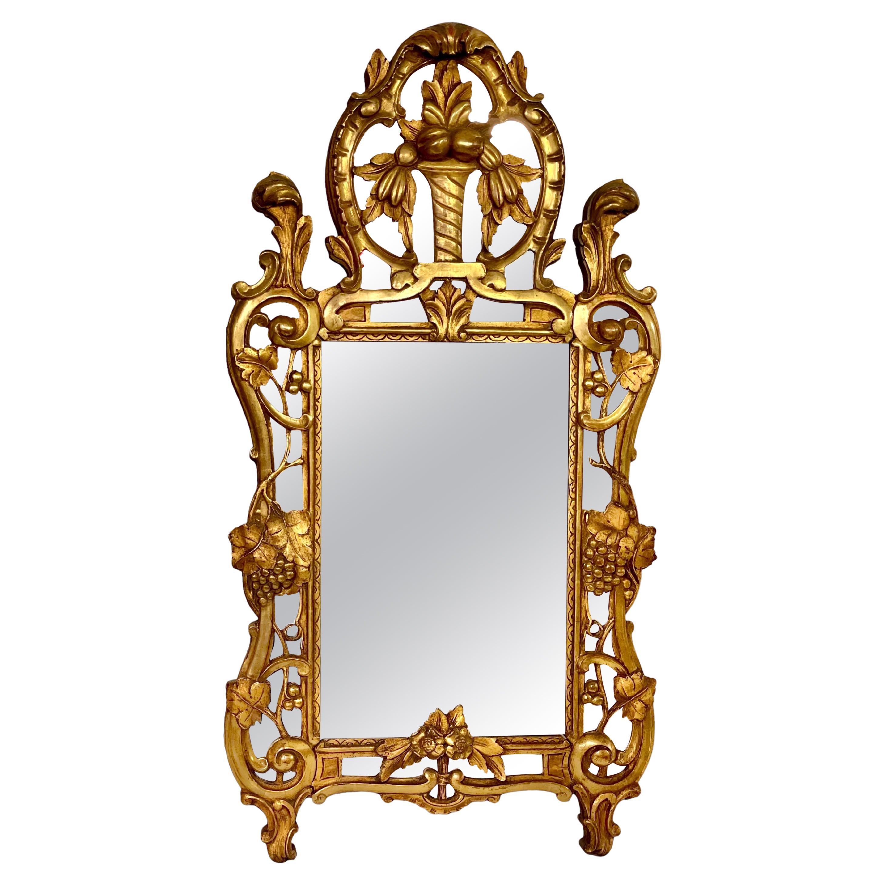 Miroir de cheminée en bois doré Régence du XIXe siècle