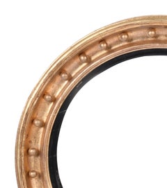 Specchio Convex Parcel-Ebonizzato in legno dorato del XIX secolo Regency