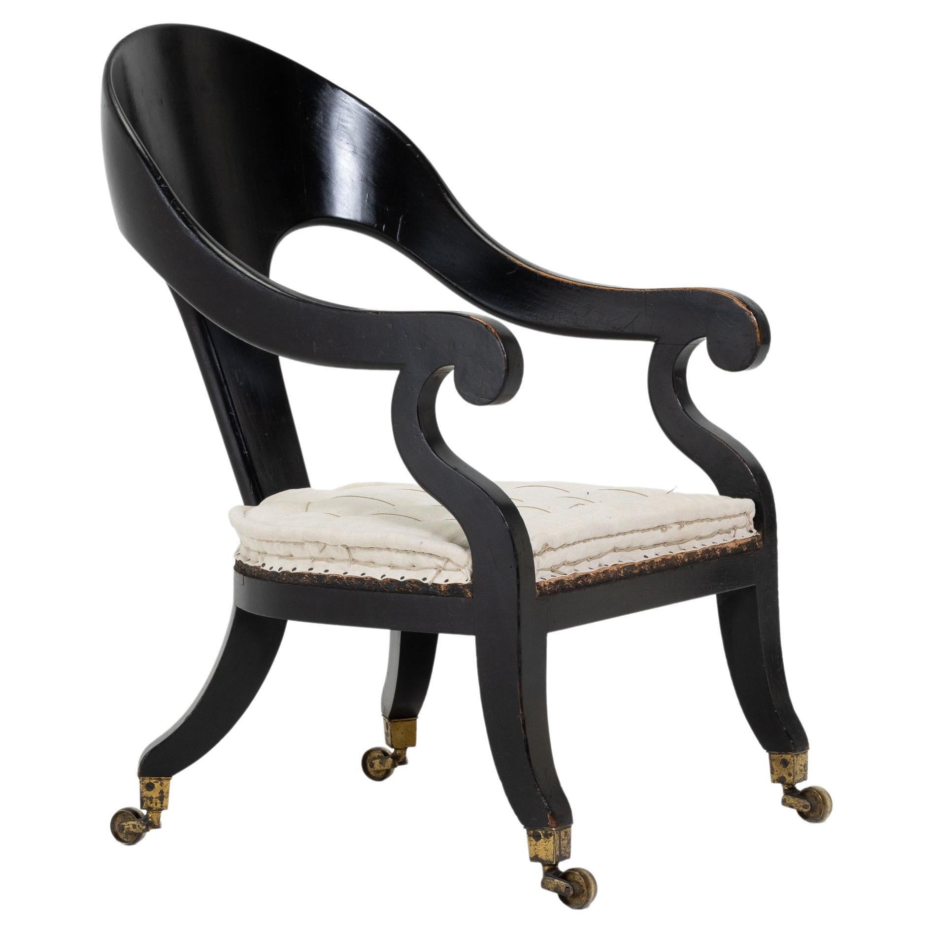 Fauteuil Regency en bois d'ébène du XIXe siècle