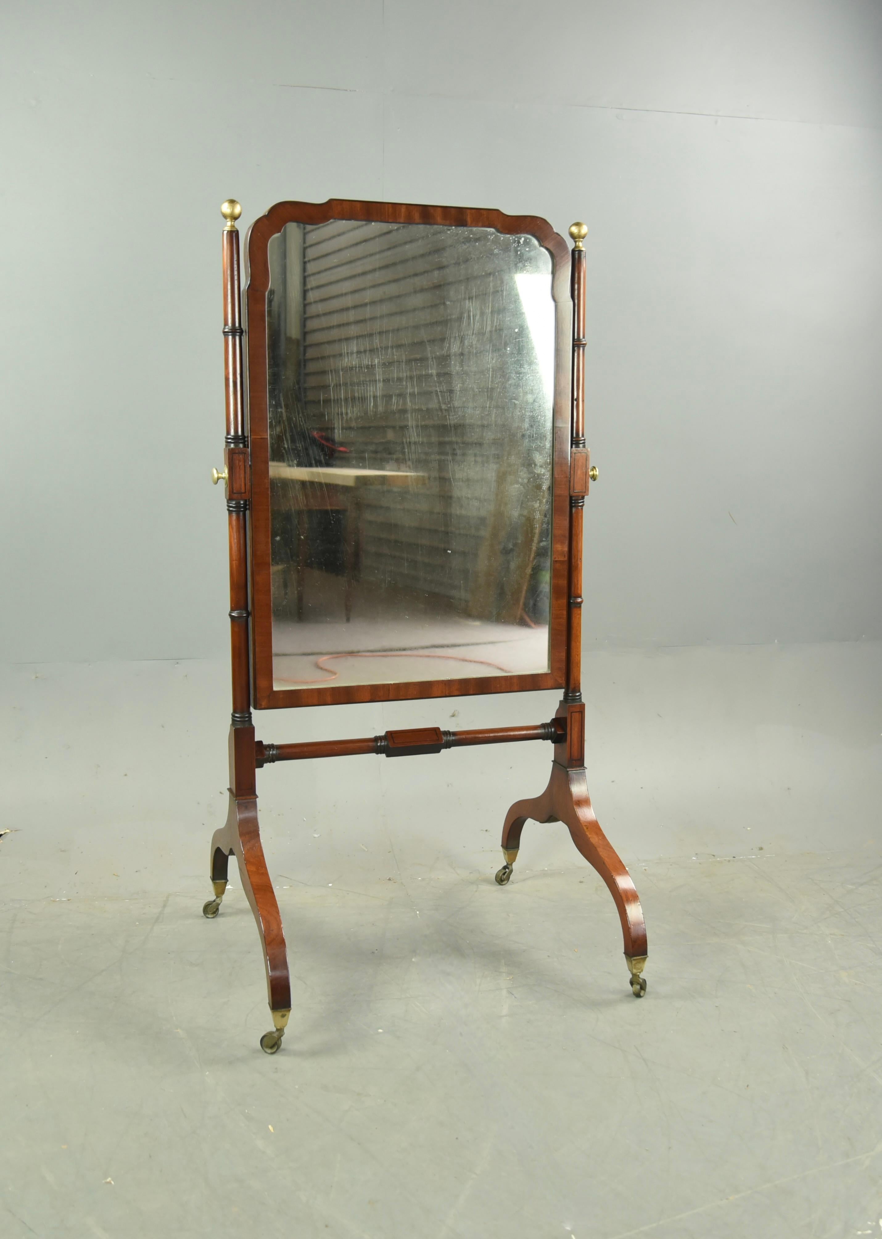 The frame is in great condition a great colour and stands very elegantly typical of the Regency period 
It stands on original brass castors , 
The original mirror plate does have some light fogging but still gives good reflection and gives it