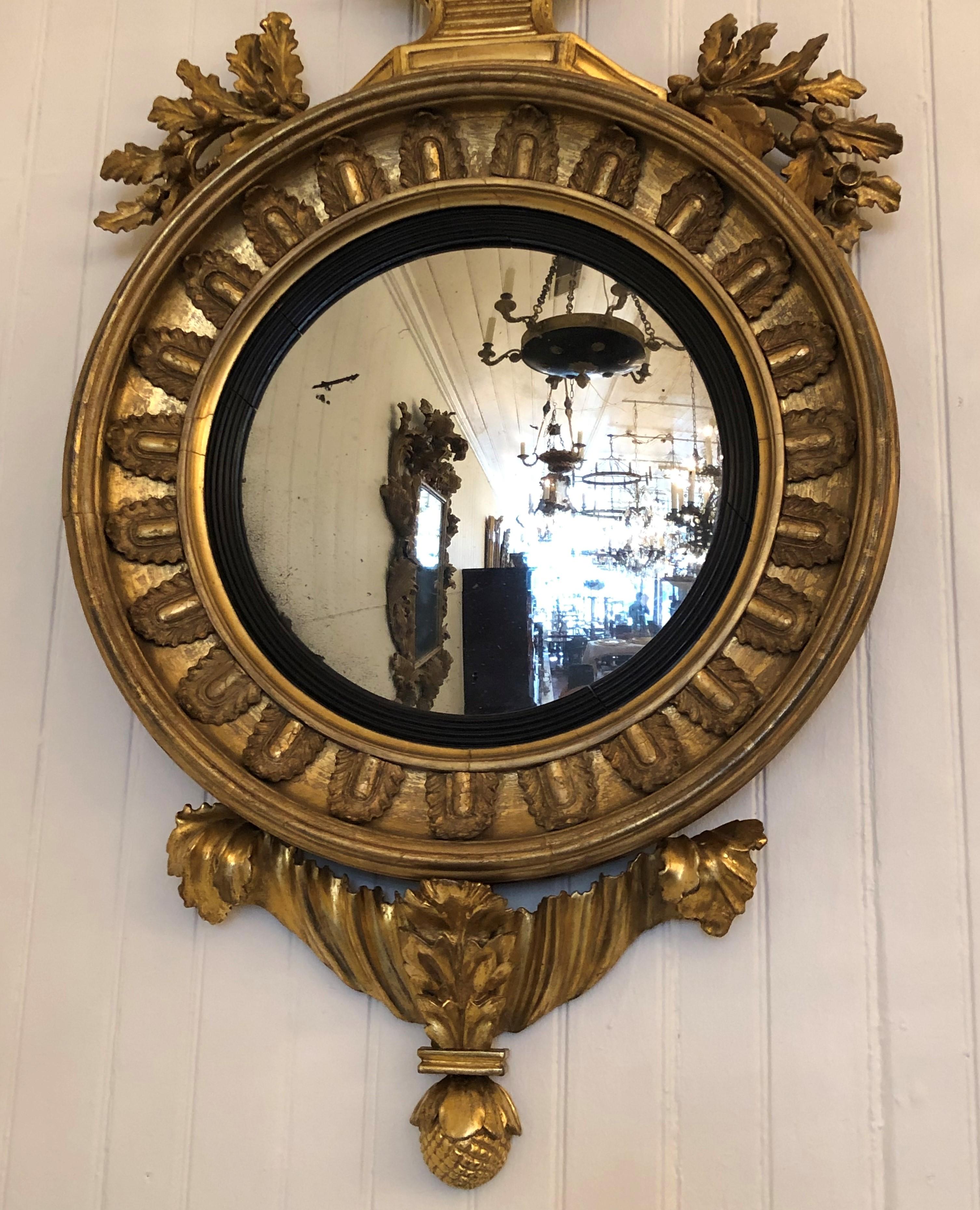 English 19th Century Regency Gilt and Ebonized Convex Mirror For Sale