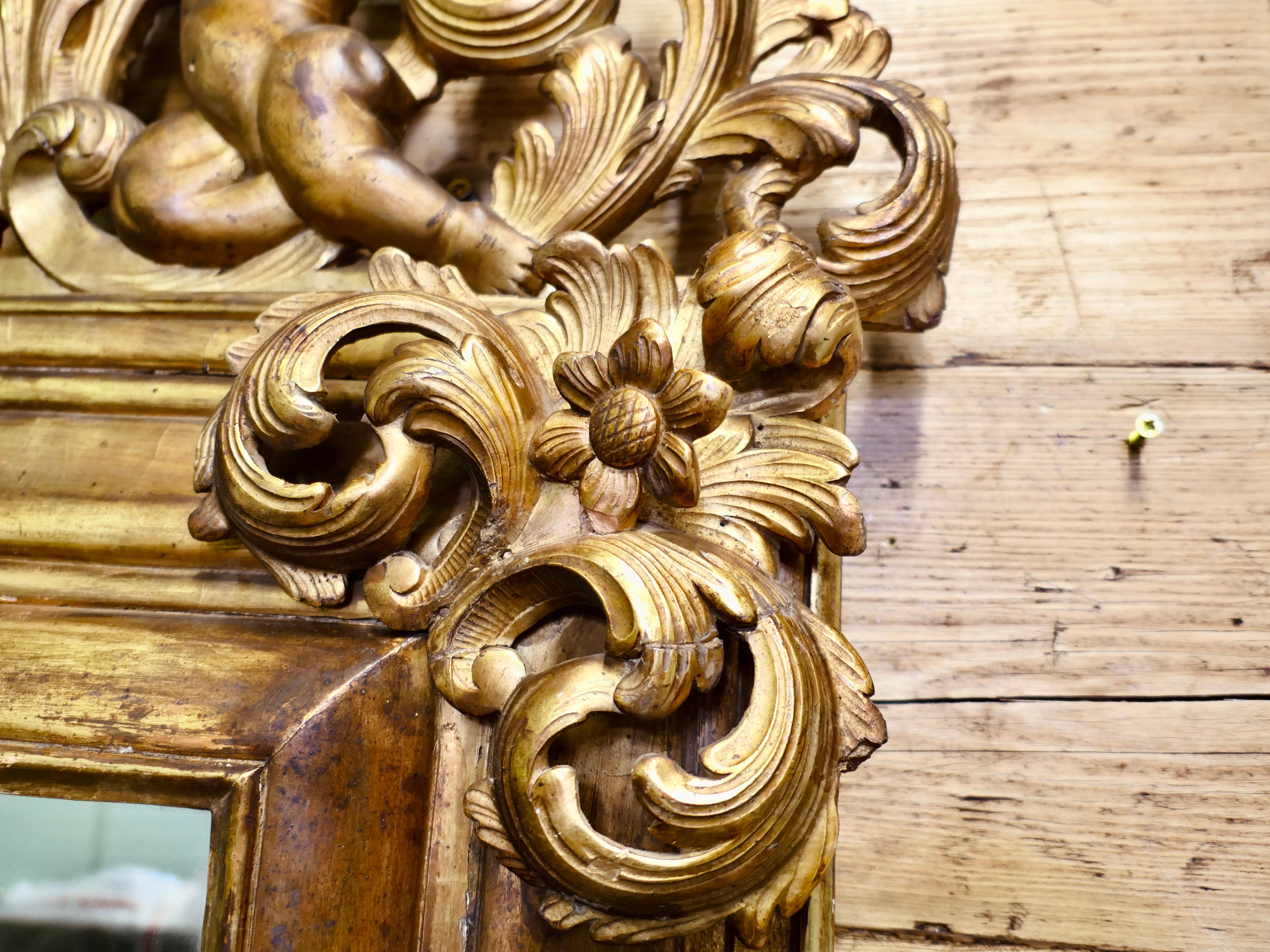 Giltwood 19th Century Regency Gilt Mirror This is a very impressive large carved mirror For Sale