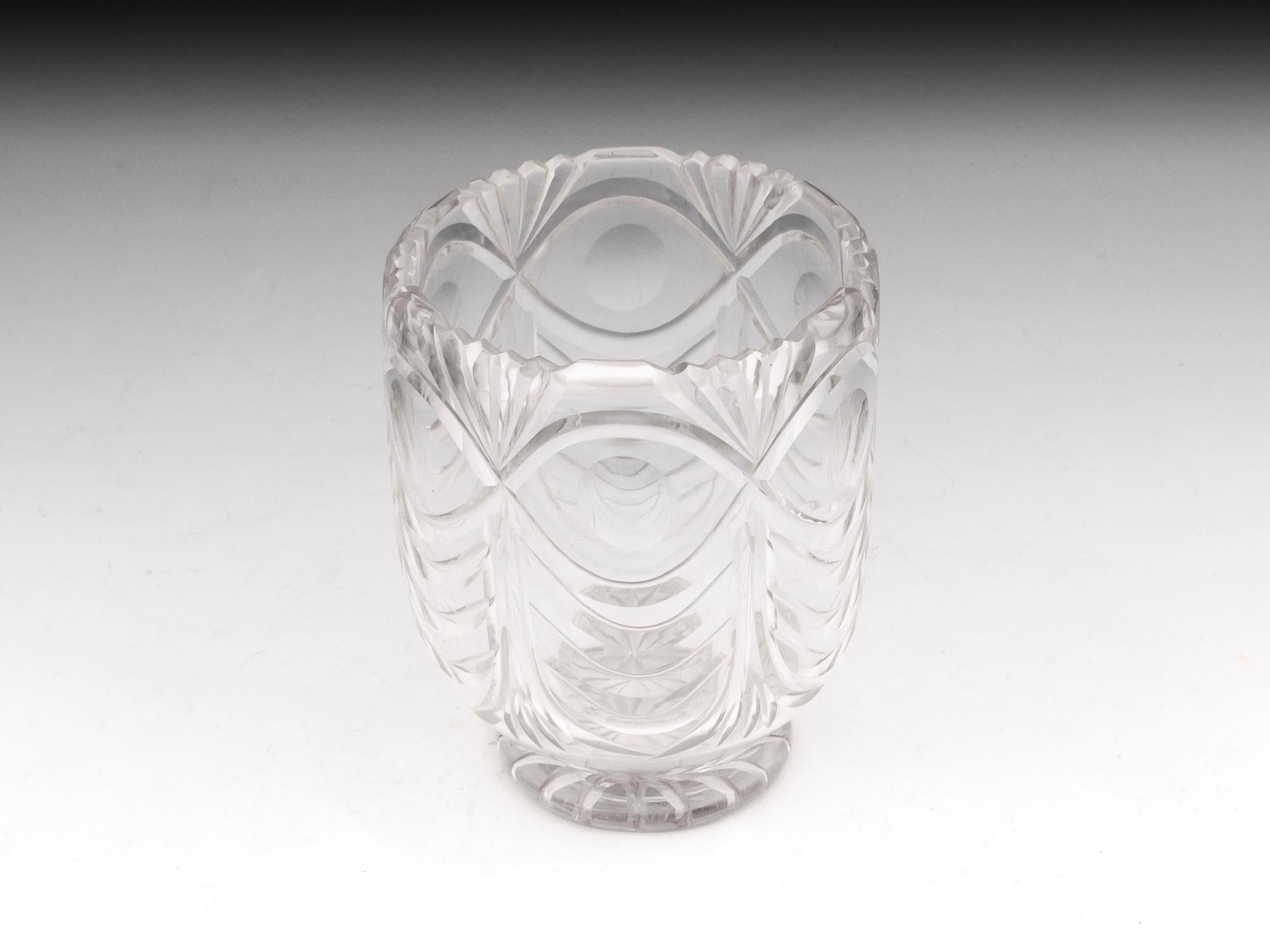 Fabulous thick cut lead crystal tea caddy bowl. With wonderful symmetrical wheel cut designs that look like eyes, with four swags underneath and six equally spaced fan shaped cuts to the top. The foot of the tea caddy bowl has a star cut base.