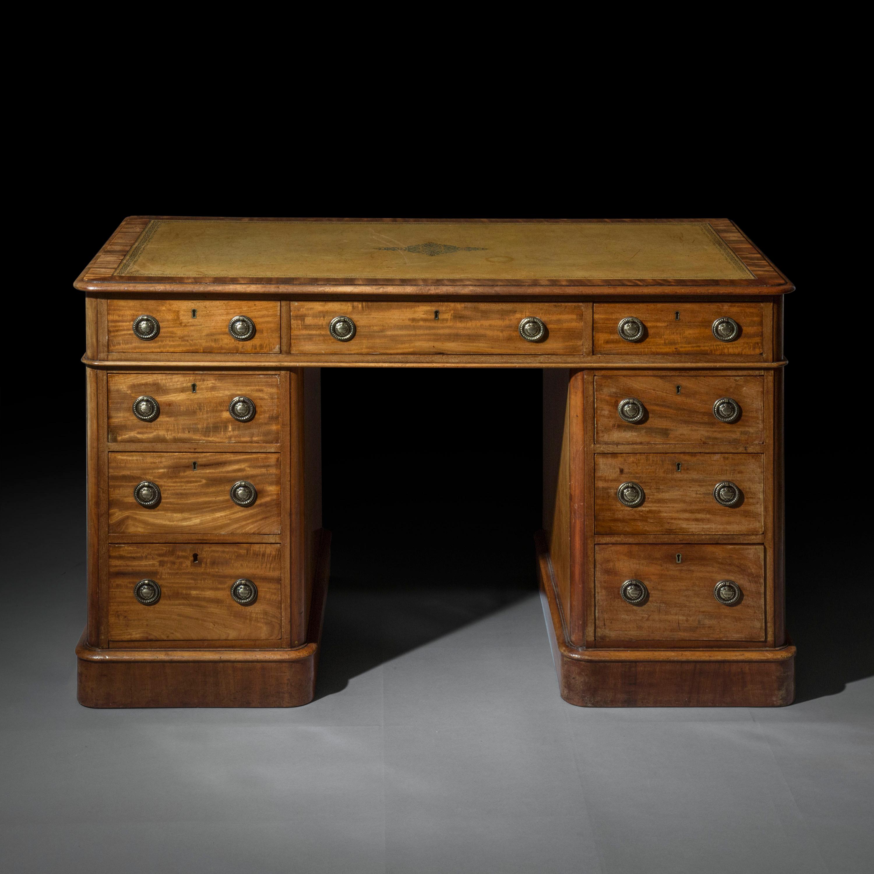 A fine quality George IV, William IV period library table or desk in beautifully faded mahogany.
English, circa 1830

Why we like it
The finest quality figured mahogany has mellowed to a most wonderful honey color. The drawers are mahogany-lined
