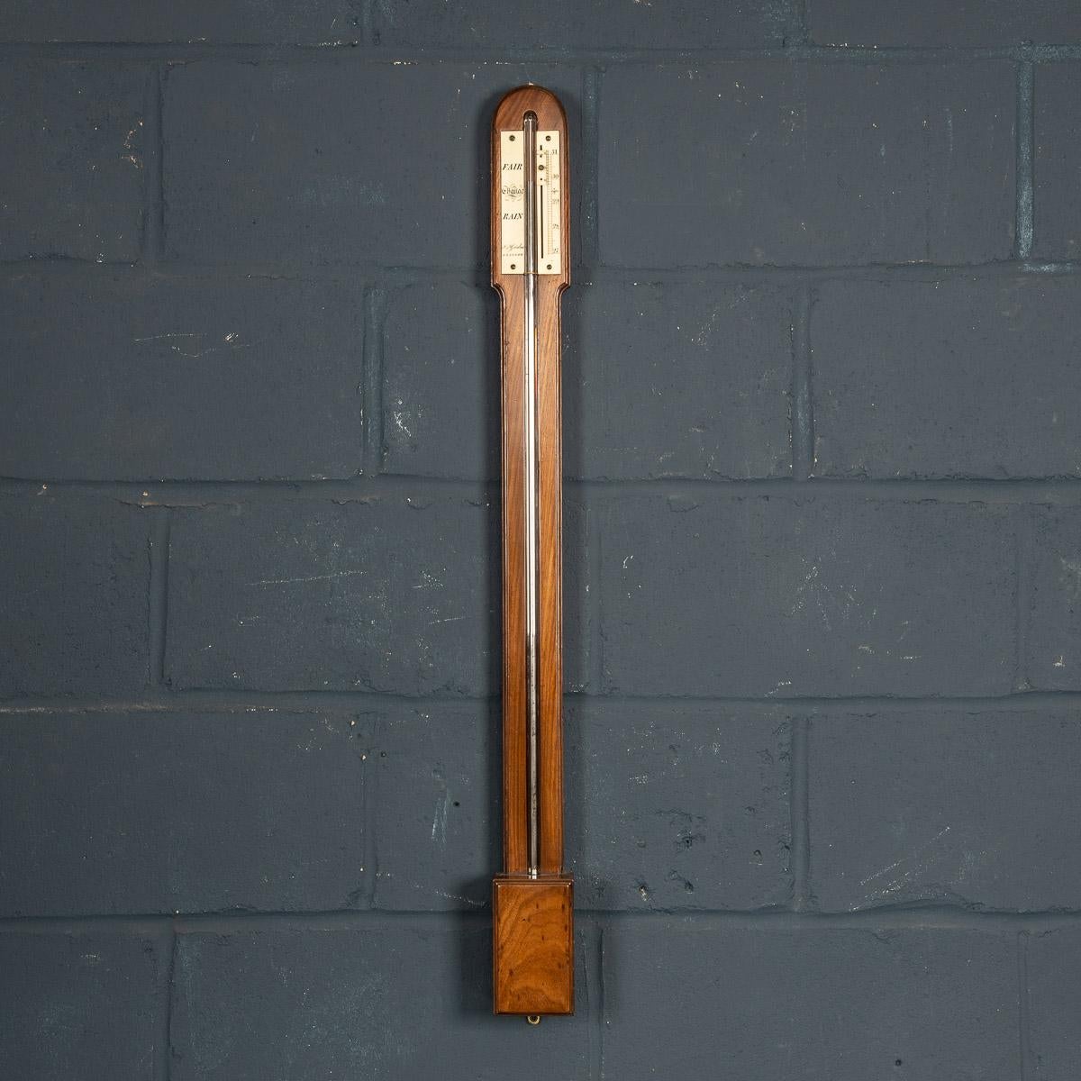 A beautiful and rare Scottish Regency mahogany stick barometer, by J & J Gardner, Glasgow. This early 19th century barometer has a visible/exposed glass tube and has an inset ivory scale calibrated in barometric inches with adjustable reading slide