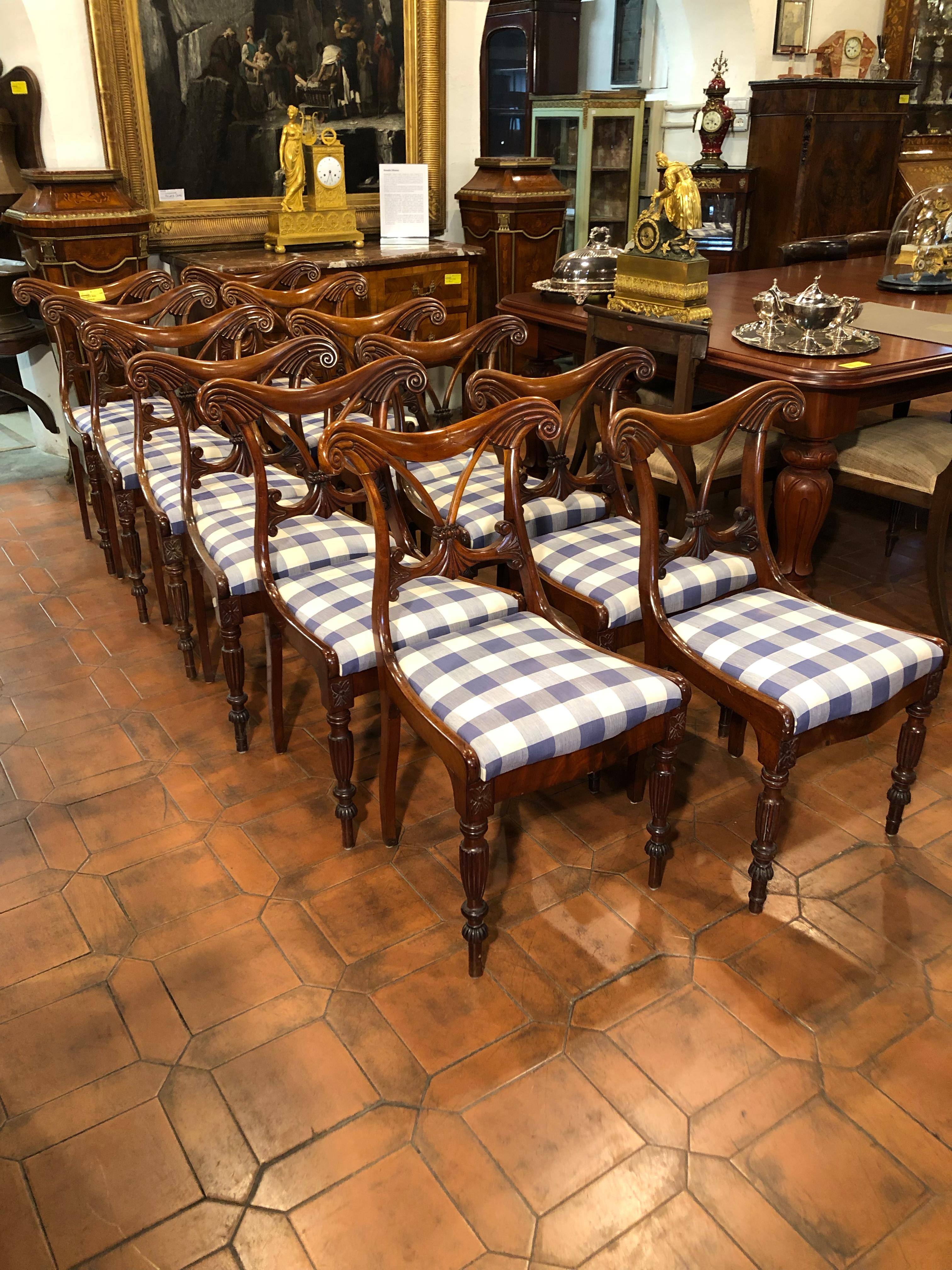 A rare set of twelve chairs, Regency period, in mahogany. In good condition but to be restored.