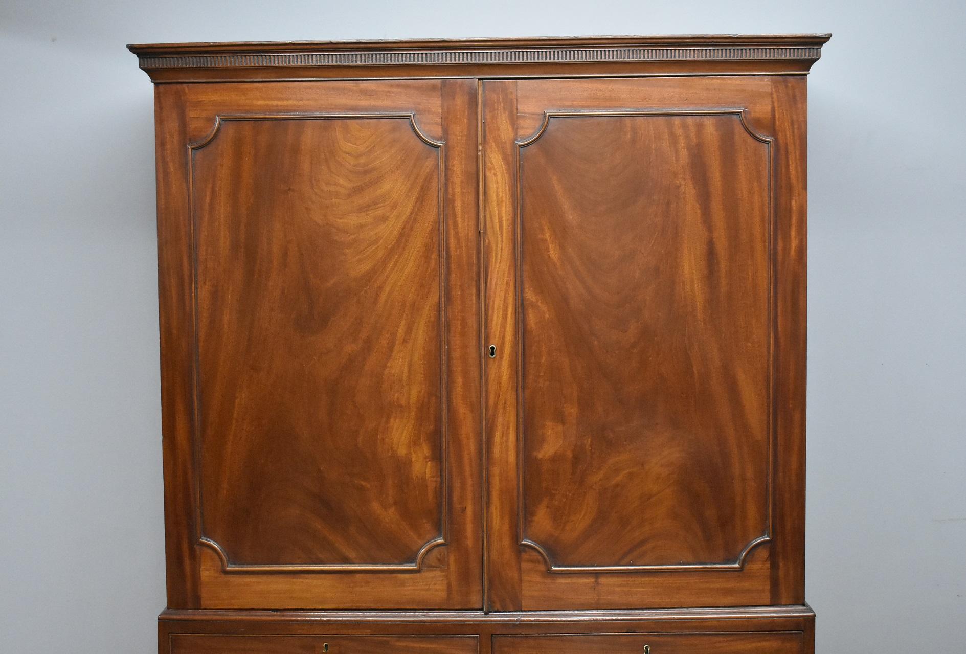 For sale is a good quality 19th century Regency mahogany linen press. The linen press has a moulded cornice, above two flame mahogany panelled doors opening to reveal the interior, comprising of two original linen trays below hanging space (the