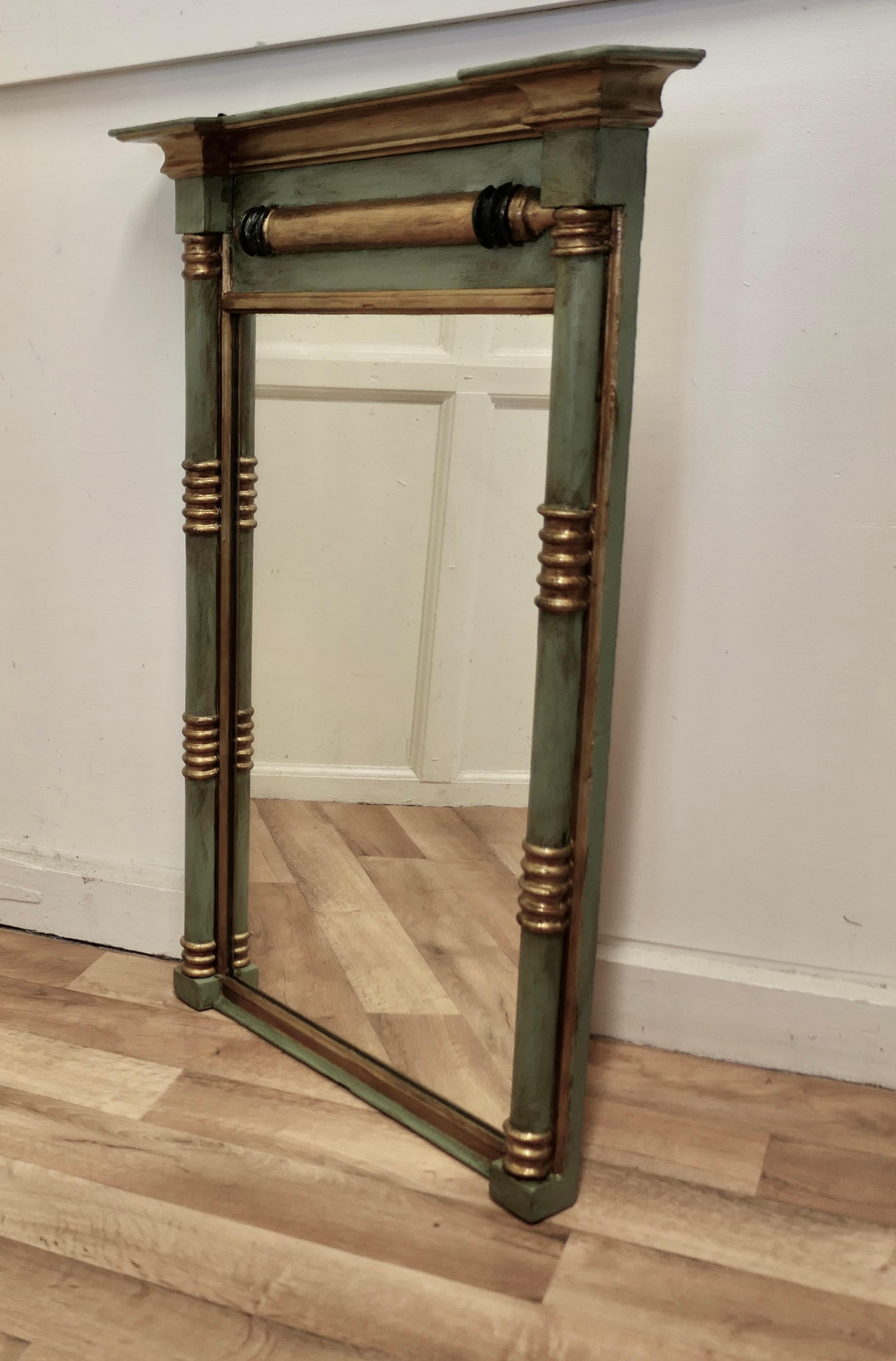 19th Century Regency moss green gilt mirror or over mantle. 

The Regency green carved frame has turned columns at either side and along the top, the Age Darkened Gold paint on the Frame has a genuine shabby look, but in generally good