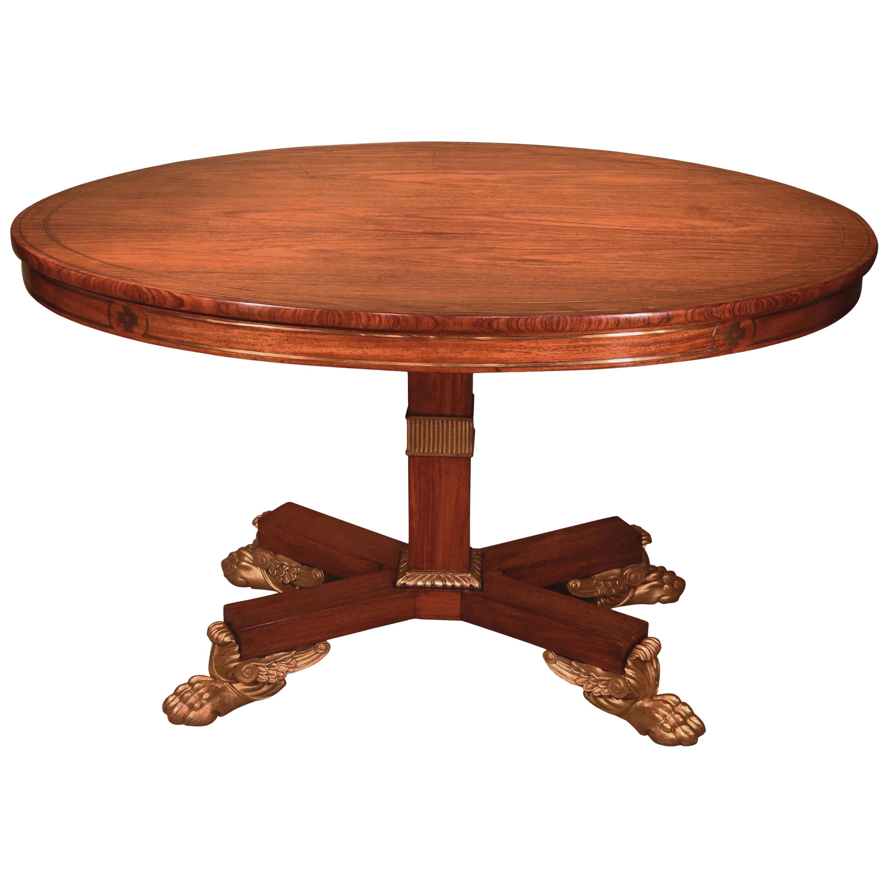 Table de petit déjeuner ovale en bois de padouk de style Régence du 19ème siècle