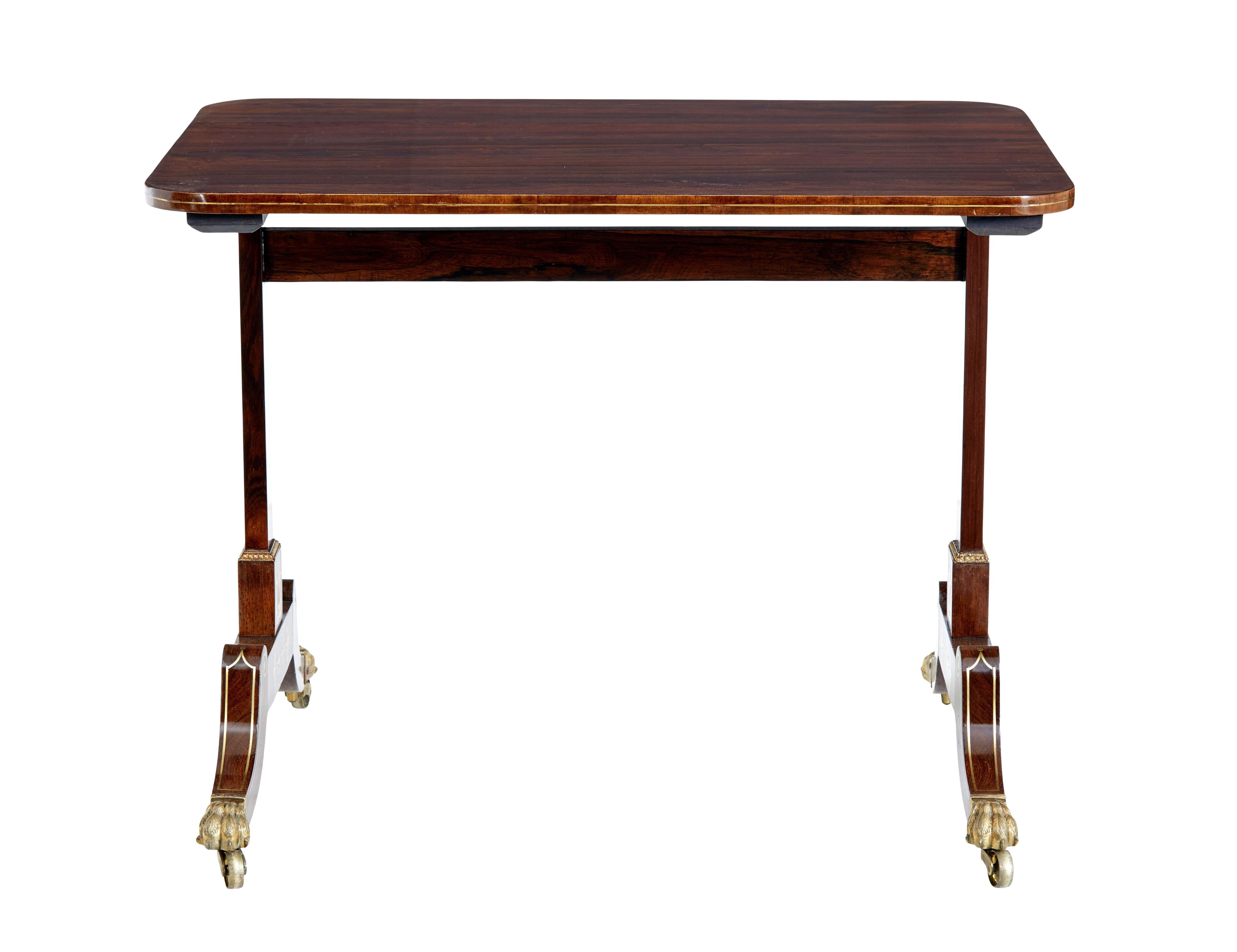 Early 19th century Regency brass inlaid palisander occasional side table circa 1820.

Top quality table in good condition. Ideal for use as a side or sofa table.

Rectangular top with rounded edge with brass stringing detail. Straight supports with