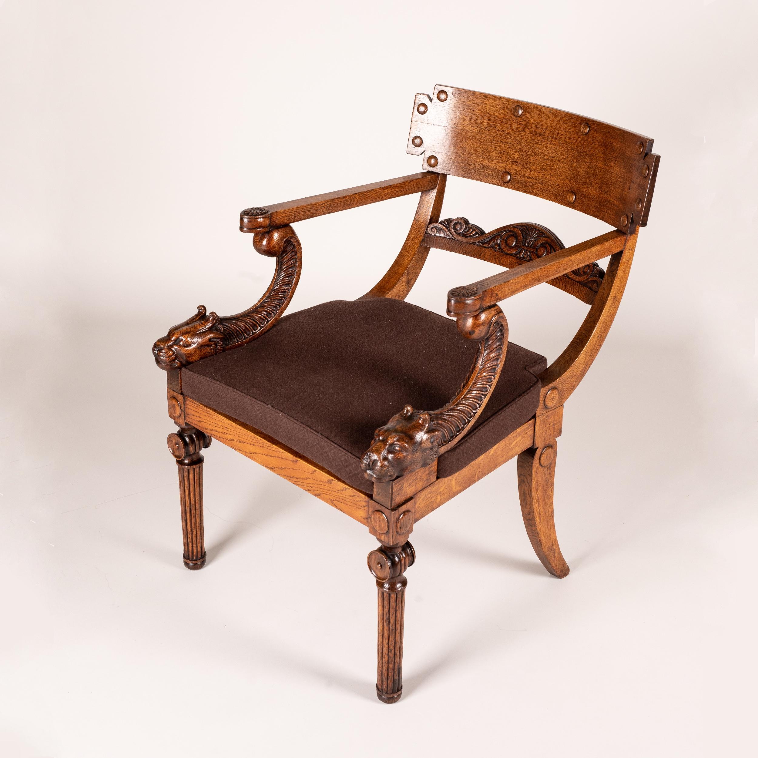 English 19th Century Regency Period Klismos Armchair with Leopard Head Carved Armrests For Sale