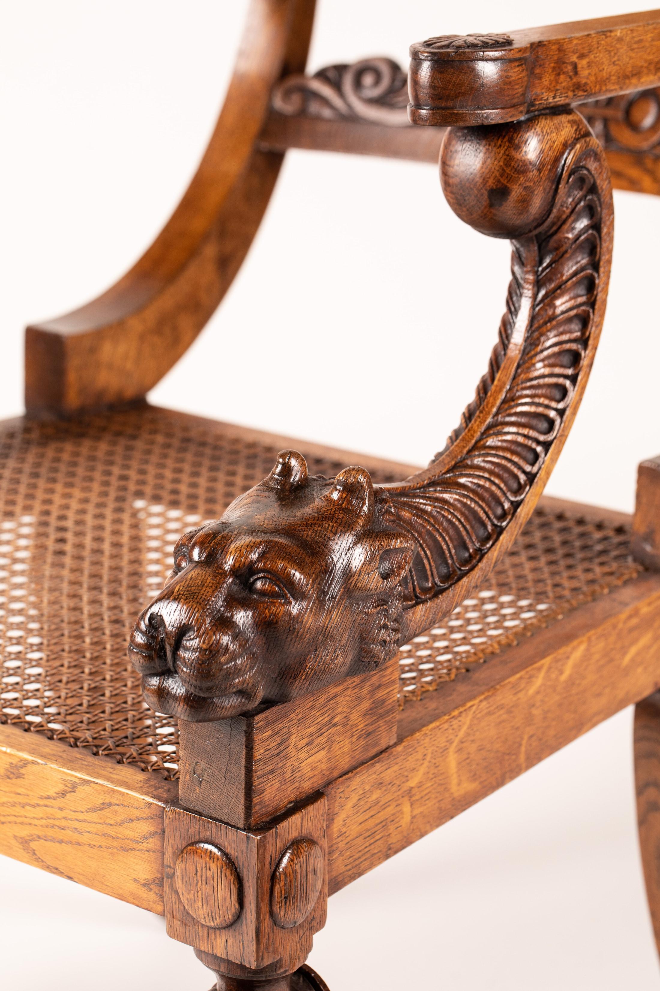 Upholstery 19th Century Regency Period Klismos Armchair with Leopard Head Carved Armrests For Sale