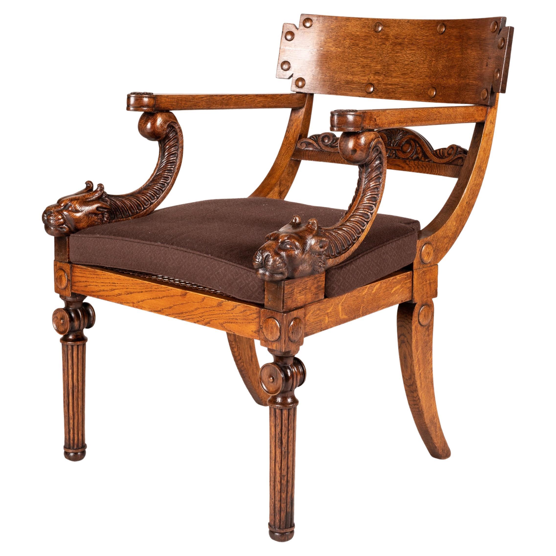 19th Century Regency Period Klismos Armchair with Leopard Head Carved Armrests For Sale