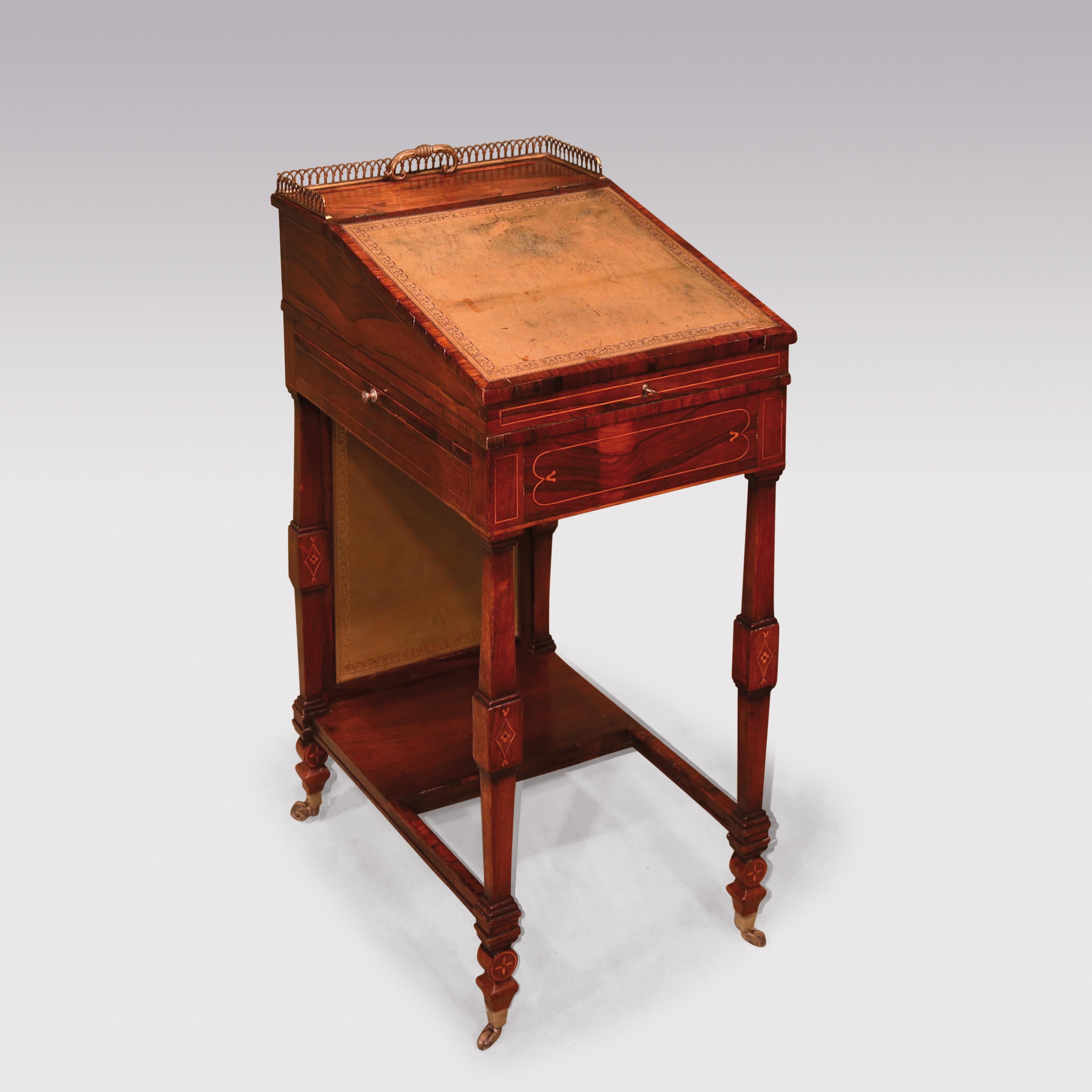 An attractive early 19th century Regency period rosewood freestanding 