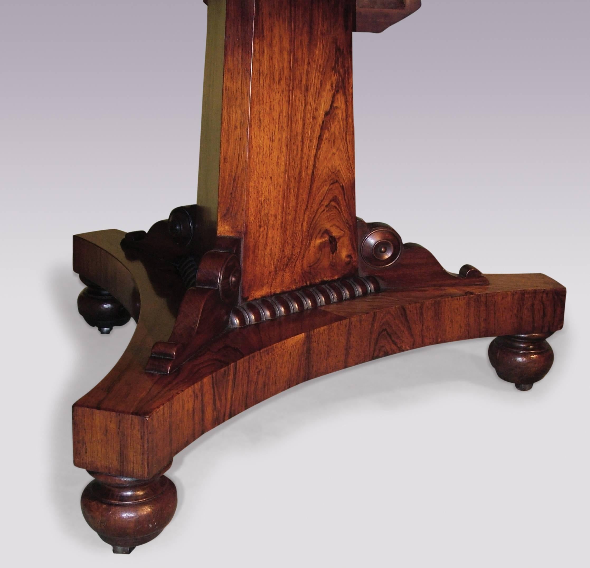 An early 19th century Regency period rosewood breakfast table, having burr elm crossbanded octagonal top stamped S. Jamar, supported on triangular tapering column raised on triform platform base, ending on turned feet with concealed castors.