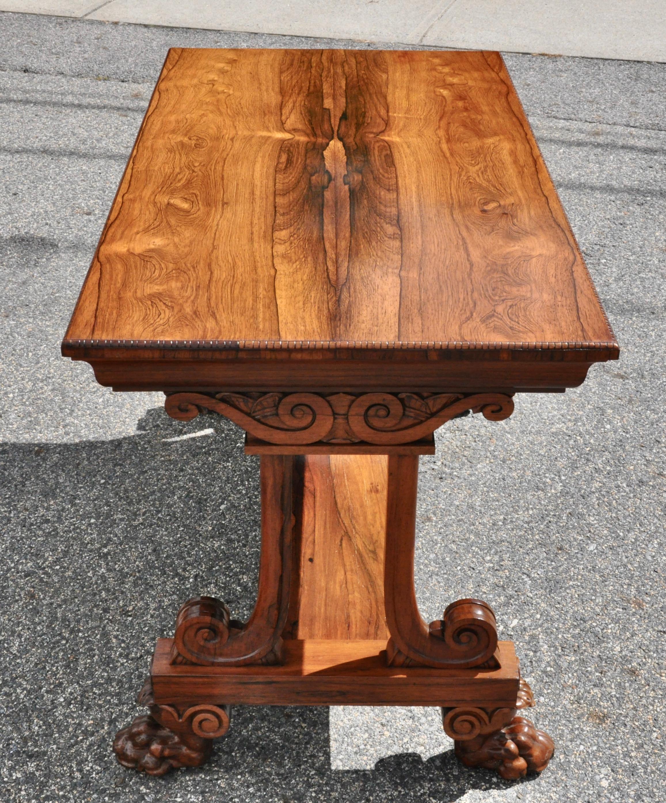 Period rosewood sofa table by the Acclaimed cabinetmakers, Thomas and George Seddon, London

On a for by Thomas Hope, neoclassical and Greek inspired. Beautiful matched rosewood.

Virtually identical to Christies, Lot 18, April 24, 2008, London
