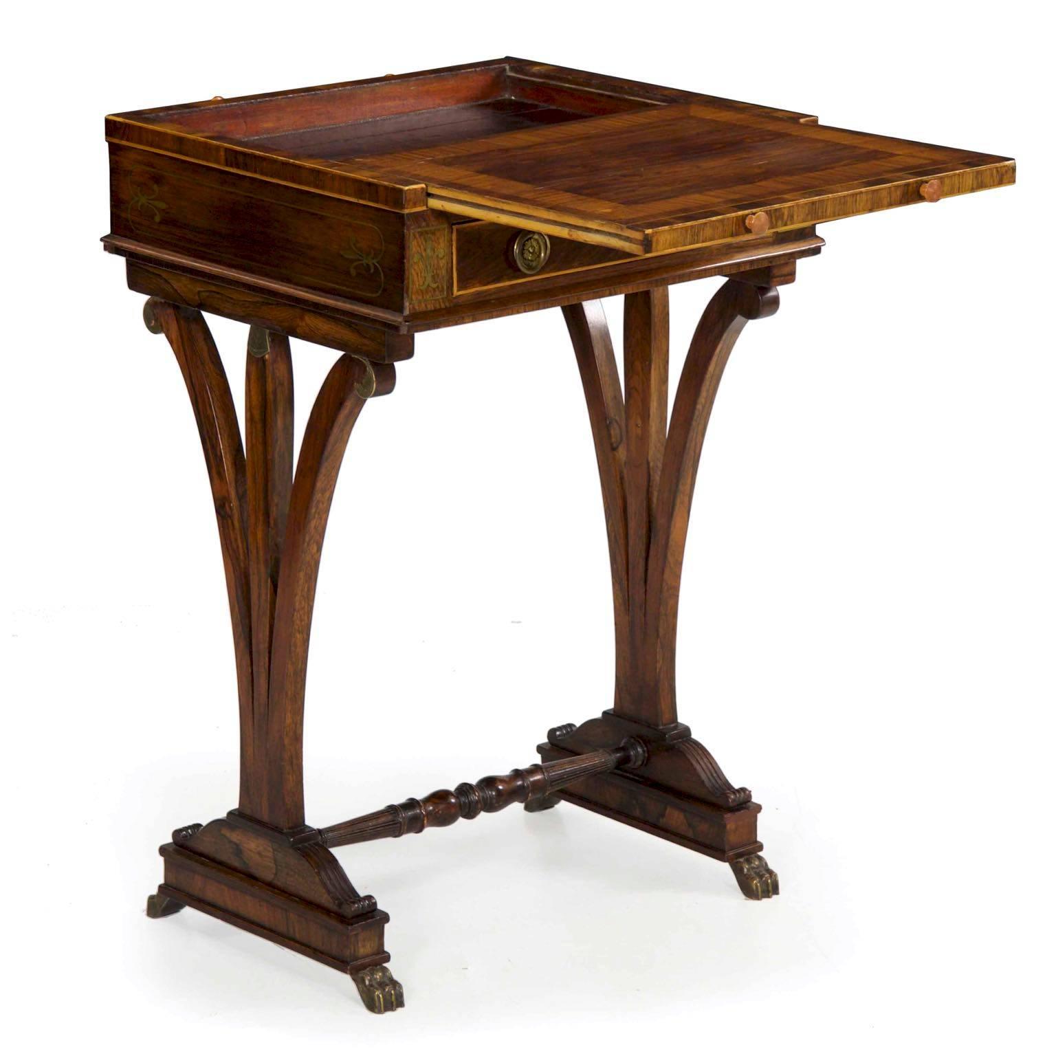 Such an unusual and intricate little beauty, this gorgeous antique writing desk doubles as a small console or accent table when not servicing as a desk. The quality is top-grade throughout with incredibly precise hand-cut dovetailing in the mahogany