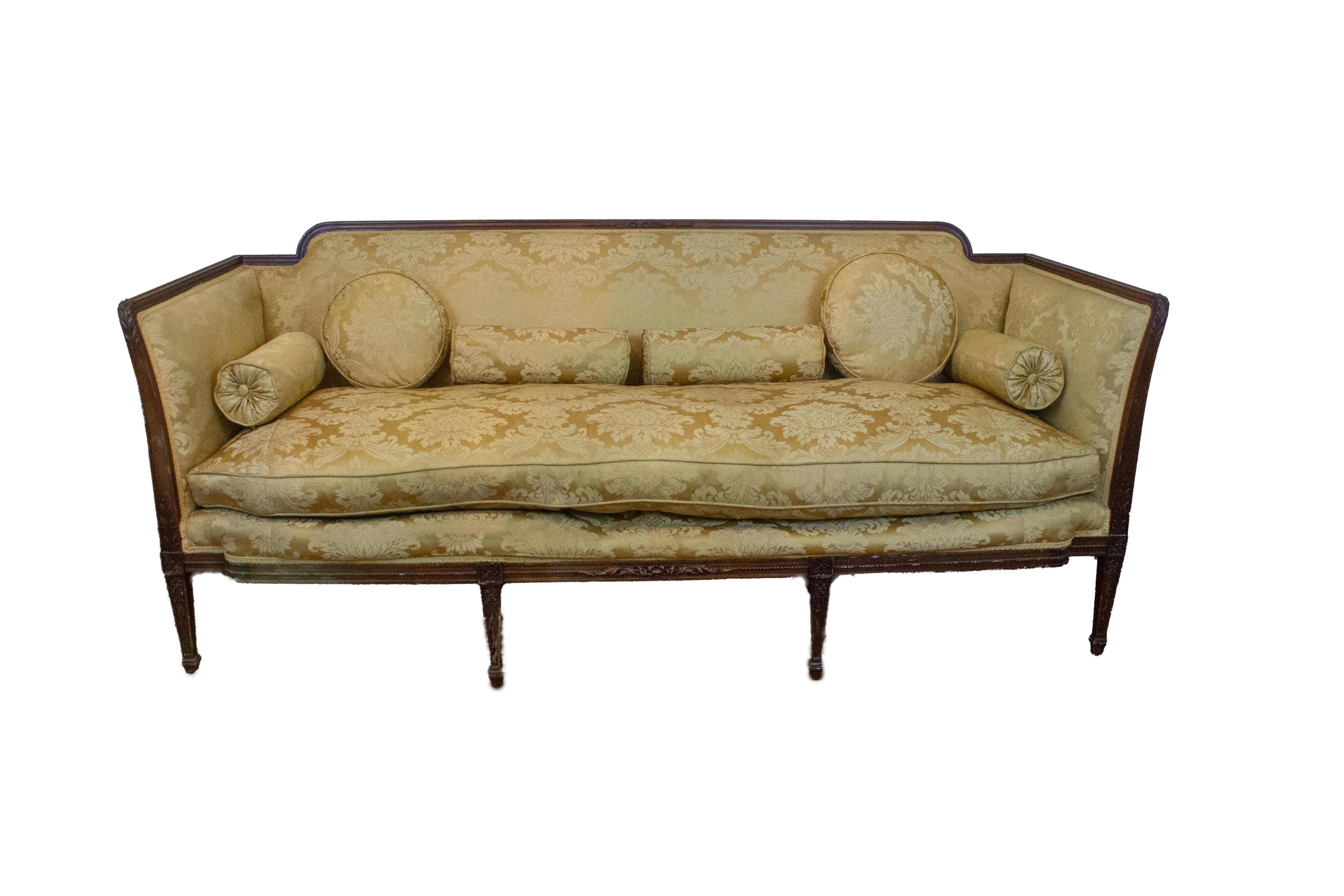 19th century Regency sofa with gold damask upholstery and hand-carved mahogany. 

The sofa was created in America and is exemplary of the classic regency style. The upholstery is a gold charmeuse satin damask textile and the square tapered legs
